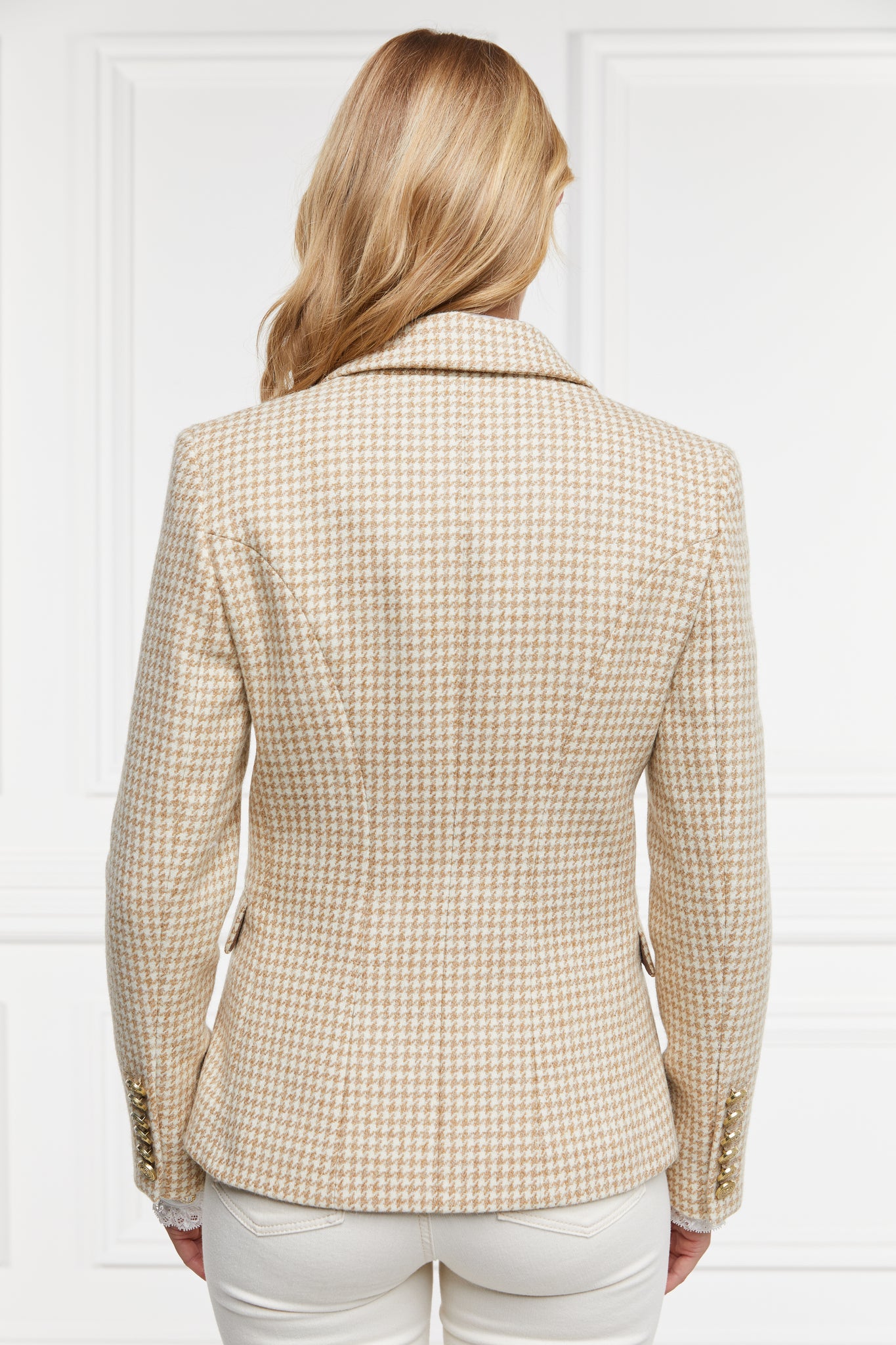back of womens cream and white small scale houndstooth fitted double breasted blazer with single button fastening to the one central button for more form fitted tailored look finished with two pockets at hips and gold button details on front and cuffs