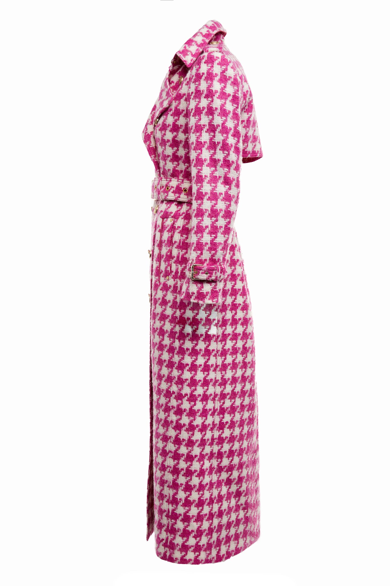 Side of womens hot pink and cream houndstooth double breasted full length trench coat