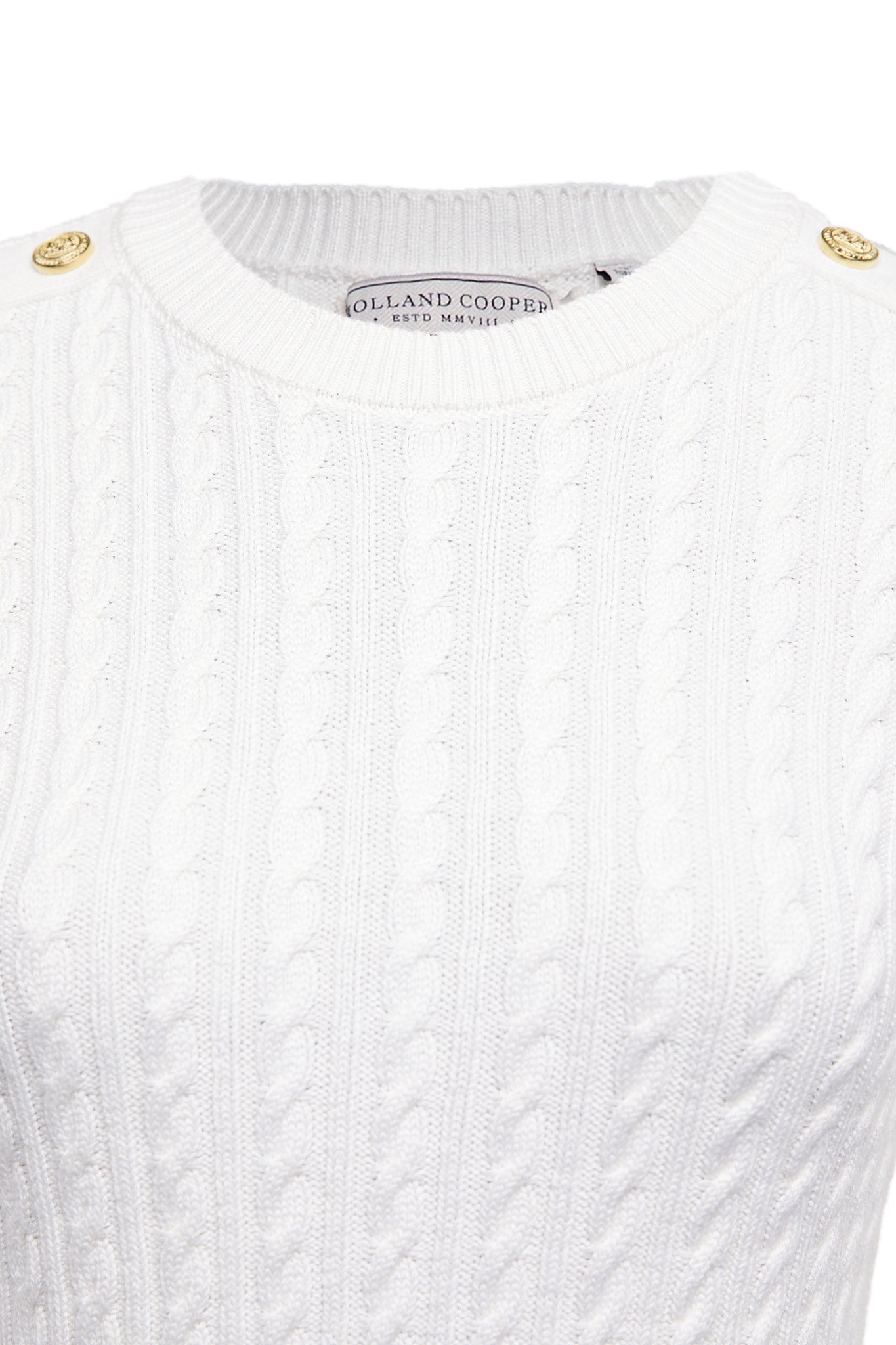 detail of cable knit womens cable knit jumper in white with ribbed crew neck cuffs and hem