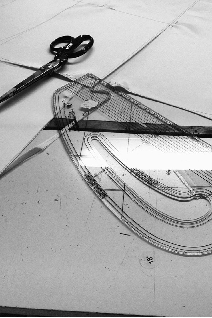 Design instruments on table in black and white image