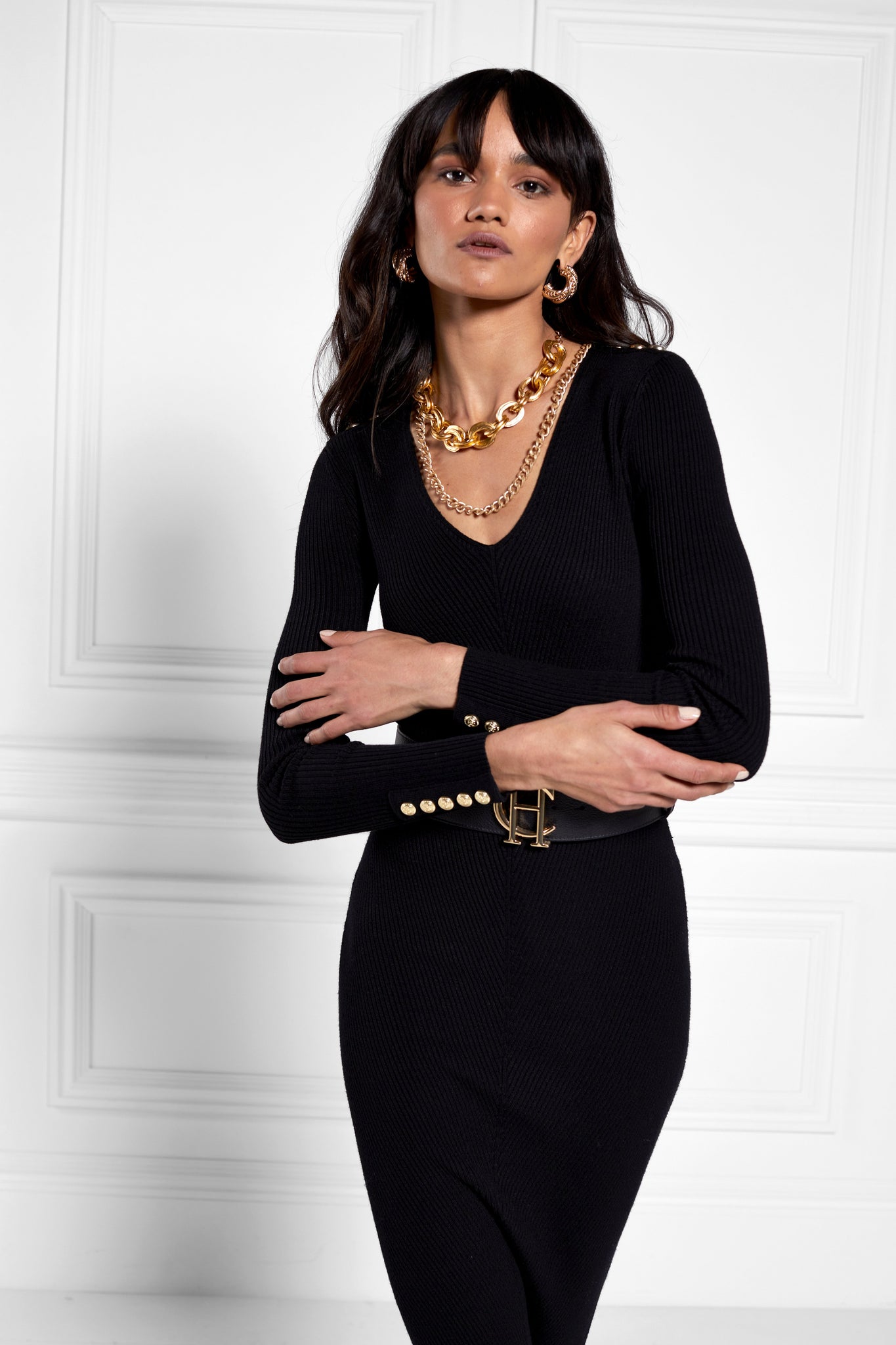 womens black long sleeve knitted v neck midi dress with gold buttons on cuffs and shoulders