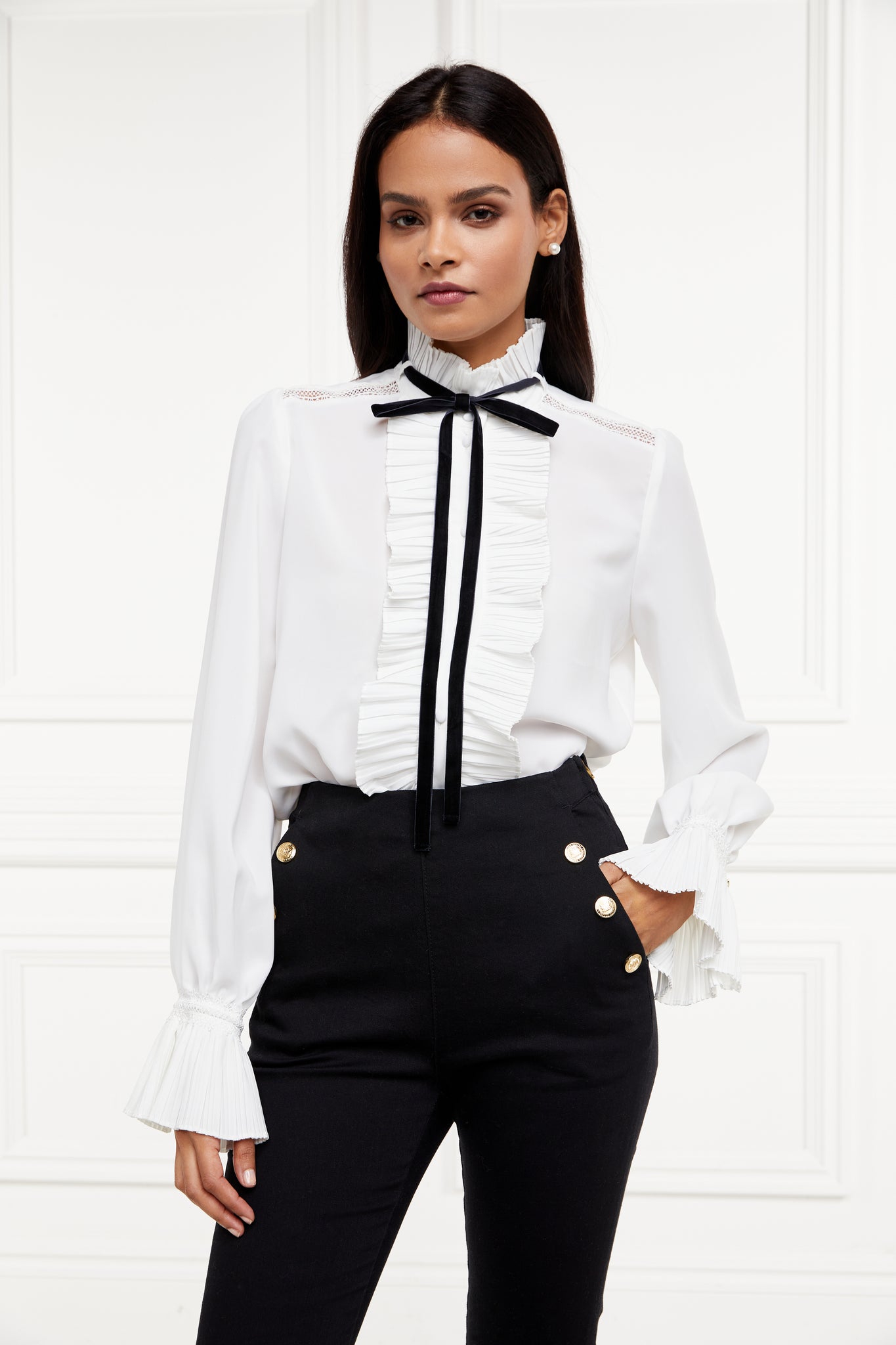 womens relaxed fit white polyester shirt with ruffled front collar and cuffs and removable black tie detail 