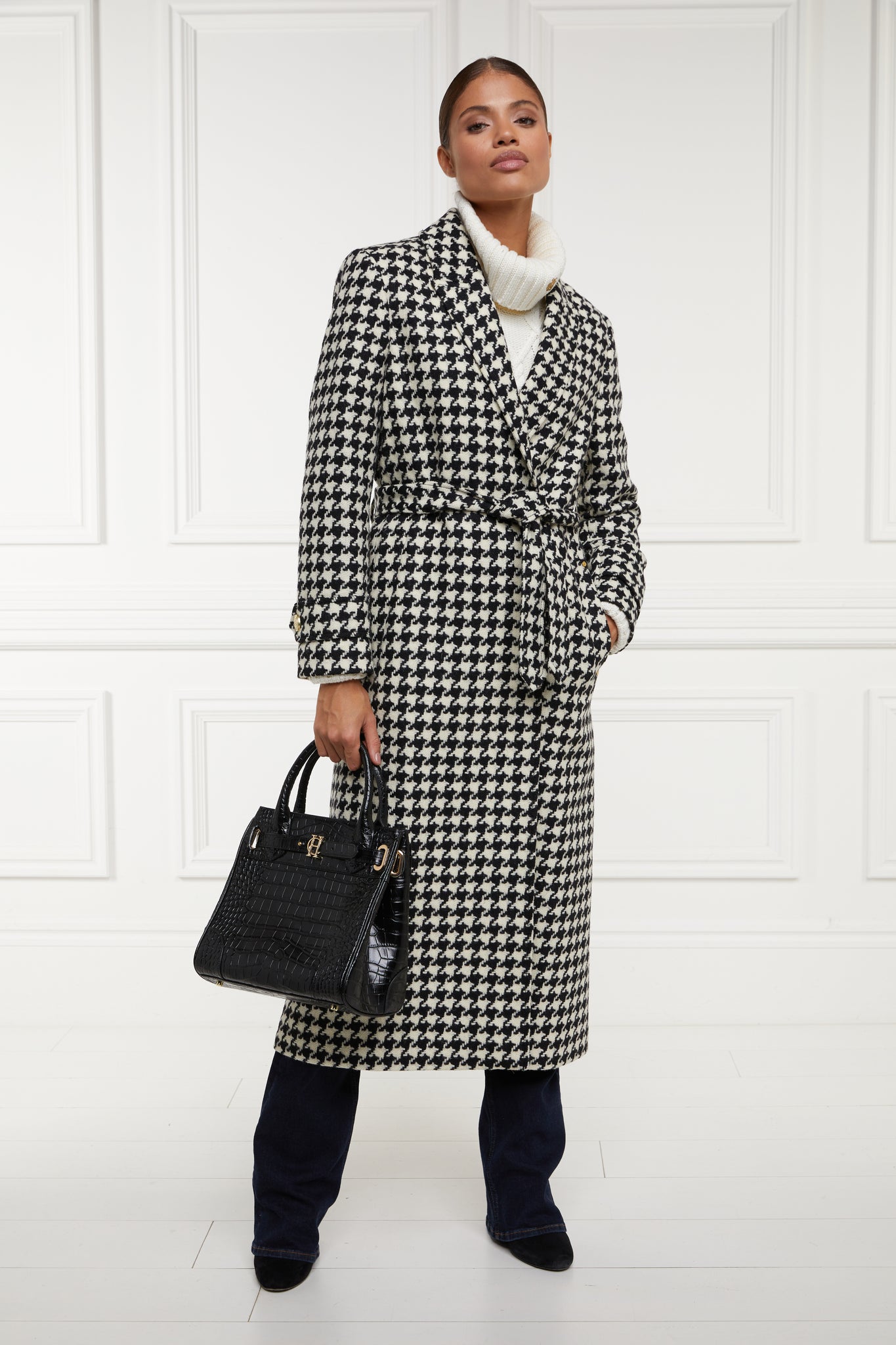Womens black and white large houndstooth mid length wrap coat with tie belt and black croc embossed leather tote bag
