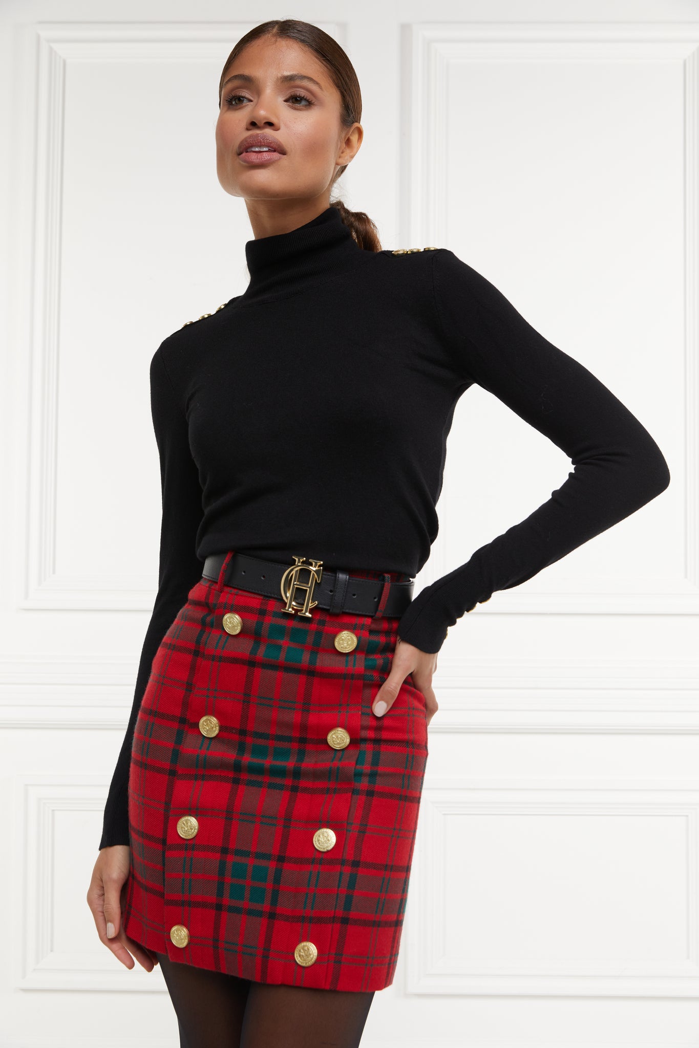 womens wool pencil mini skirt in red and green tartan check with concealed zip fastening on centre back and gold rivets down front