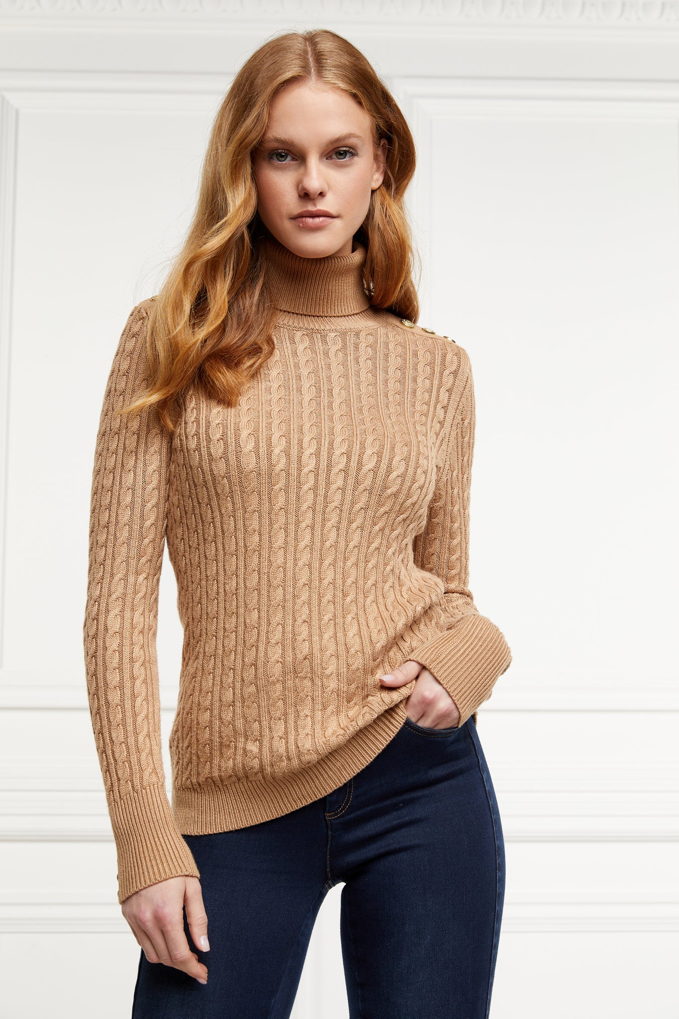 womens cable knit jumper in dark camel with ribbed roll neck cuffs and hem