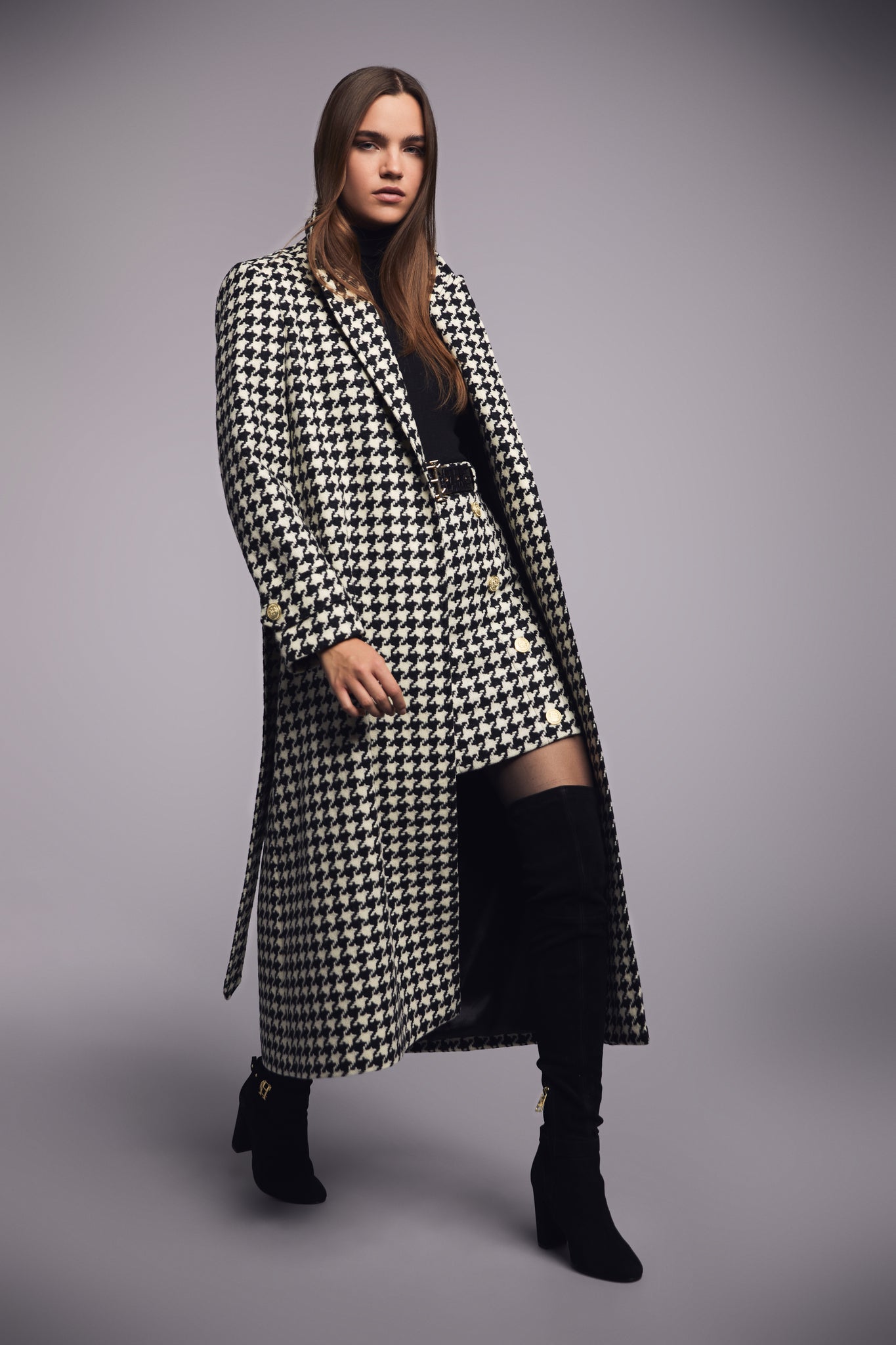 Womens black and white large houndstooth mid length wrap coat with tie belt