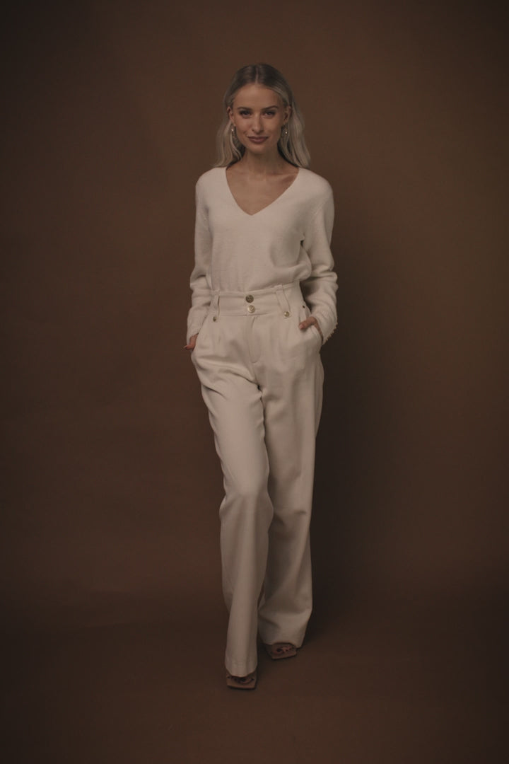 Women’s ivory wool high waisted straight trousers with wool v neck knitted top