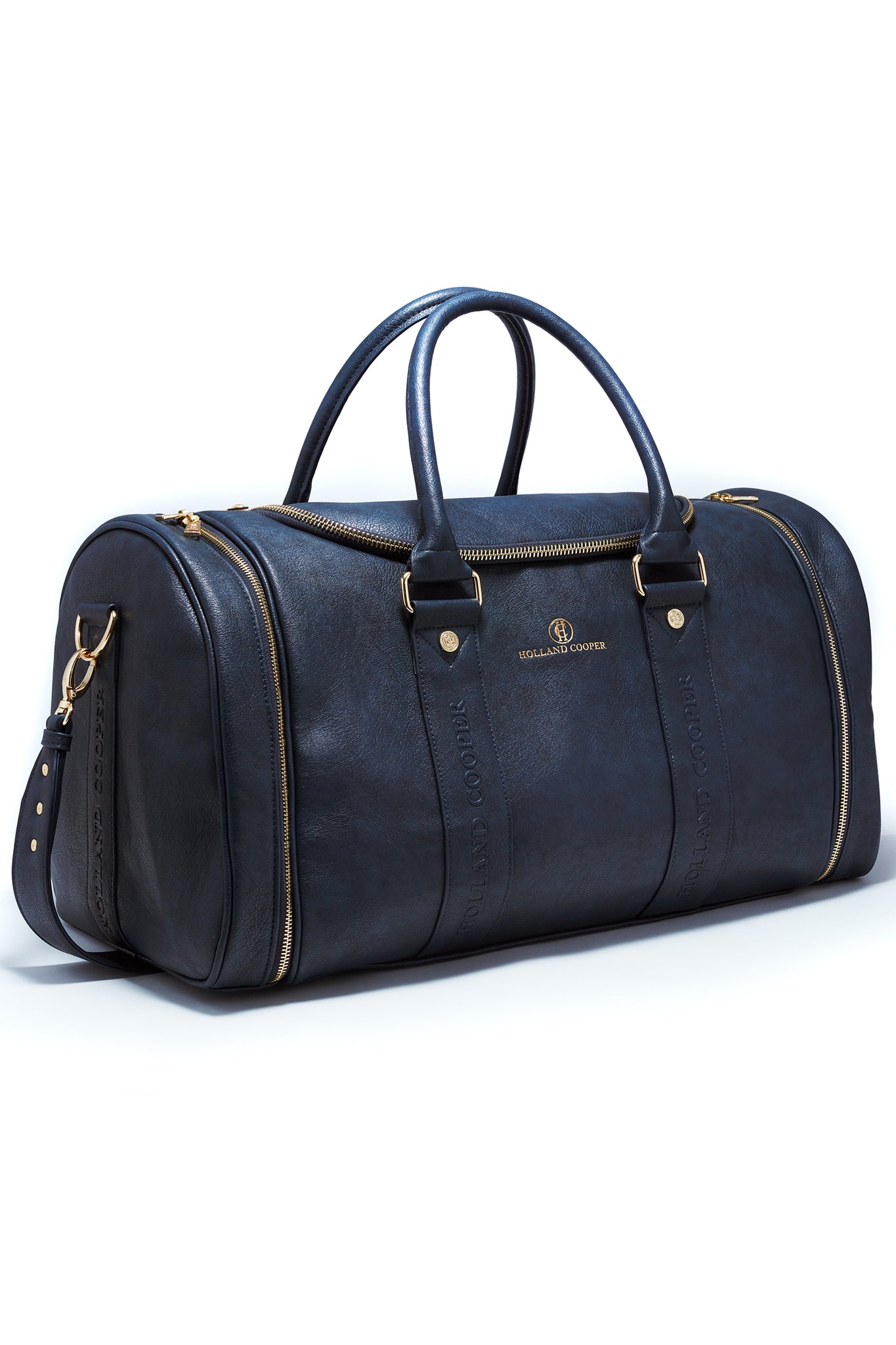 side of navy faux leather equestrian kit bag with gold hardware