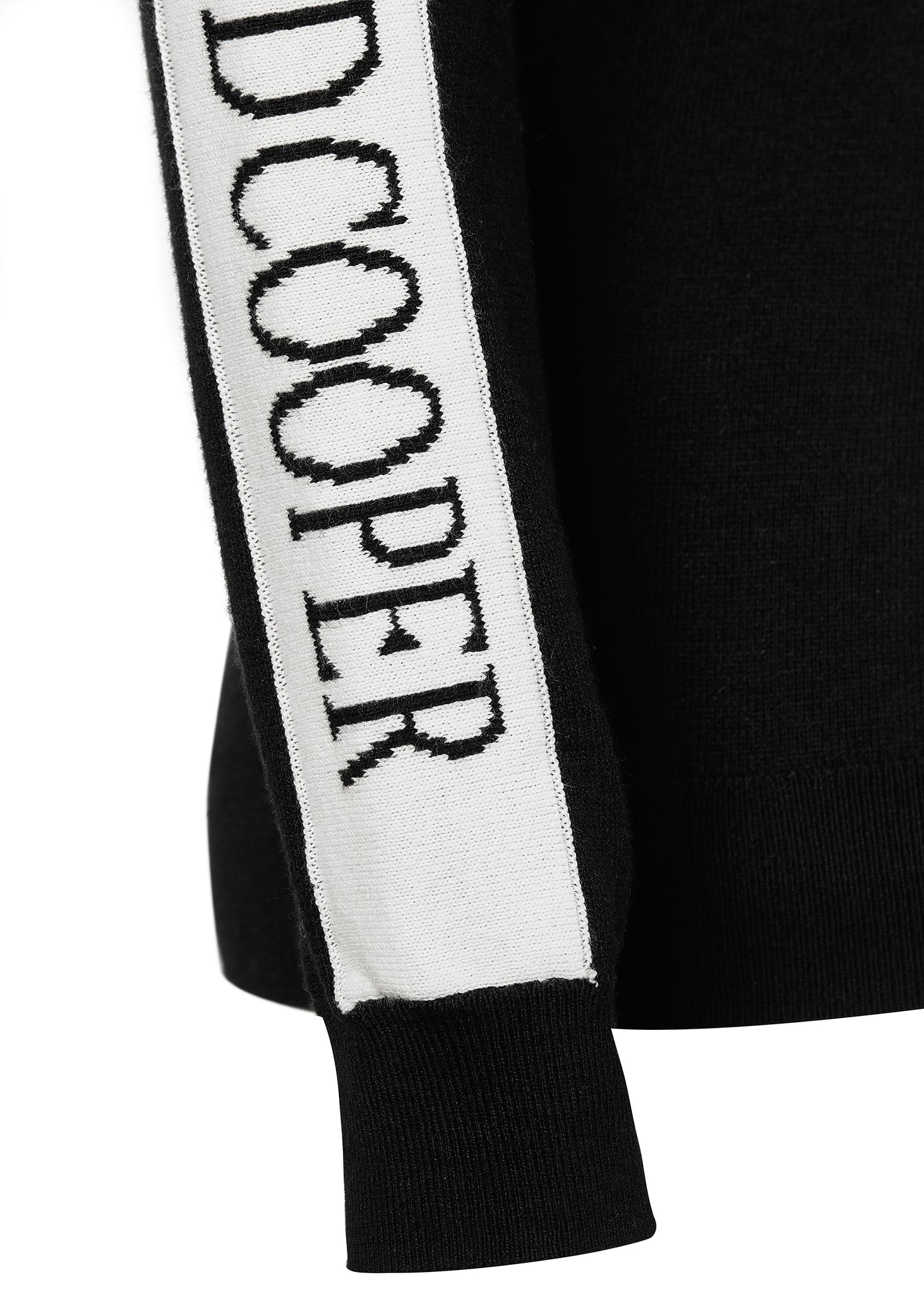 ribbed cuff detail on thermal fitted roll neck knit in black with white monogram intarsia knit panels down tops of arms
