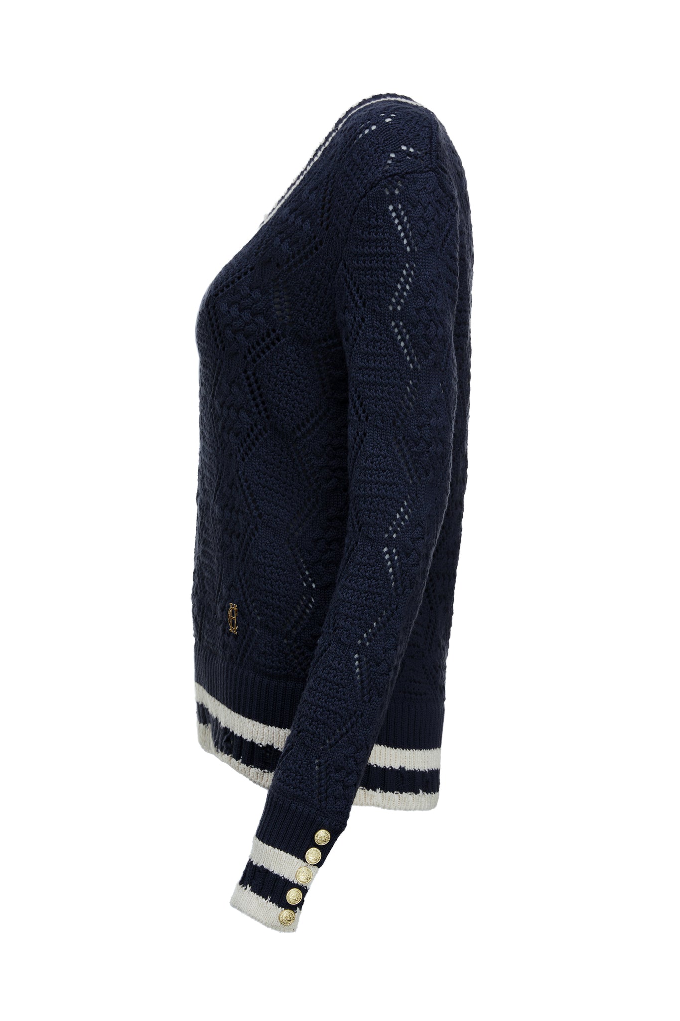 side of a cricket style v neck lightweight knit in navy with thick ribbed  cream double stripe trims on cuffs and neckline