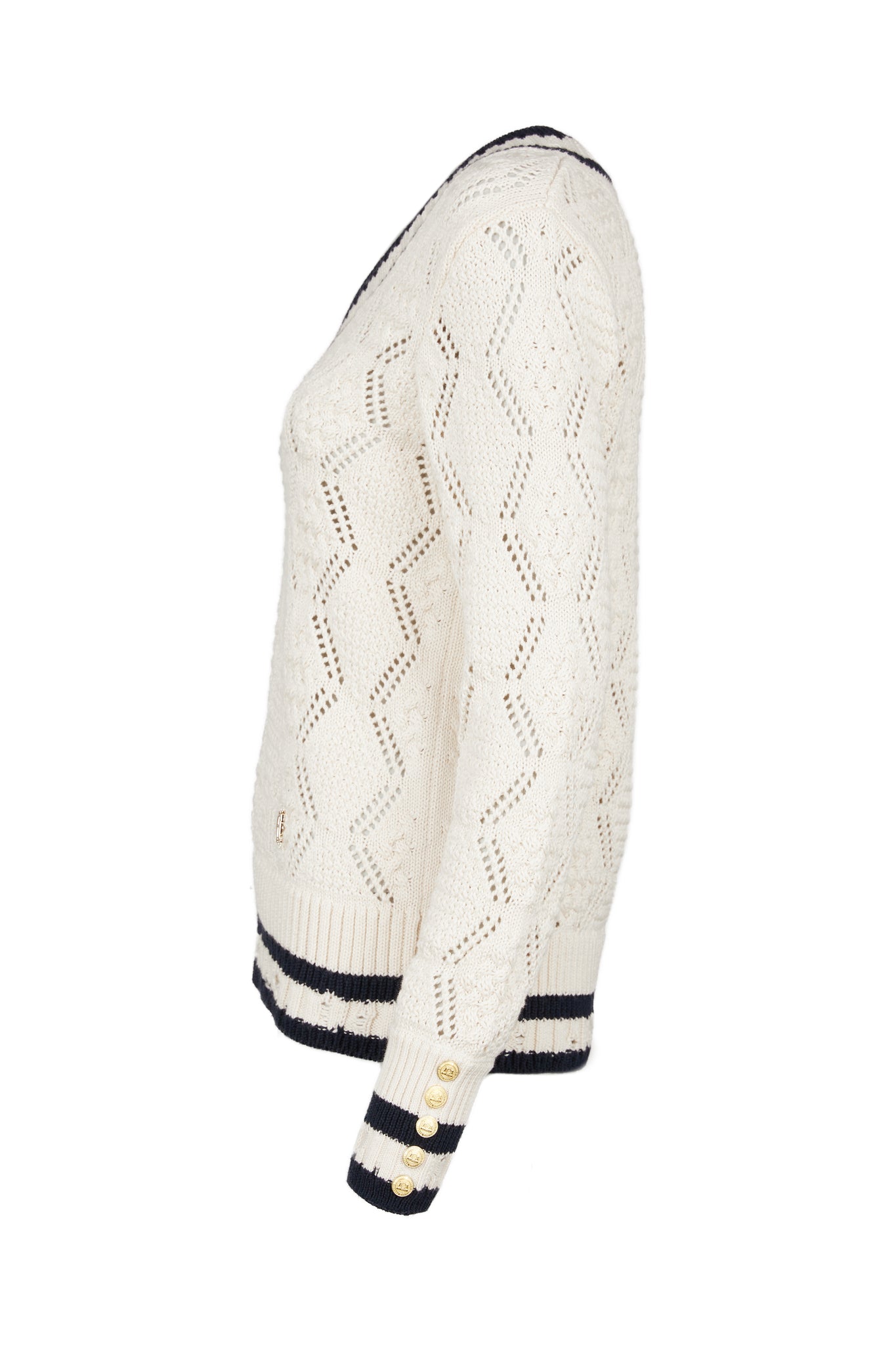 side of A cricket style v neck lightweight knit in cream with thick ribbed navy double stripe trims on cuffs and neckline 