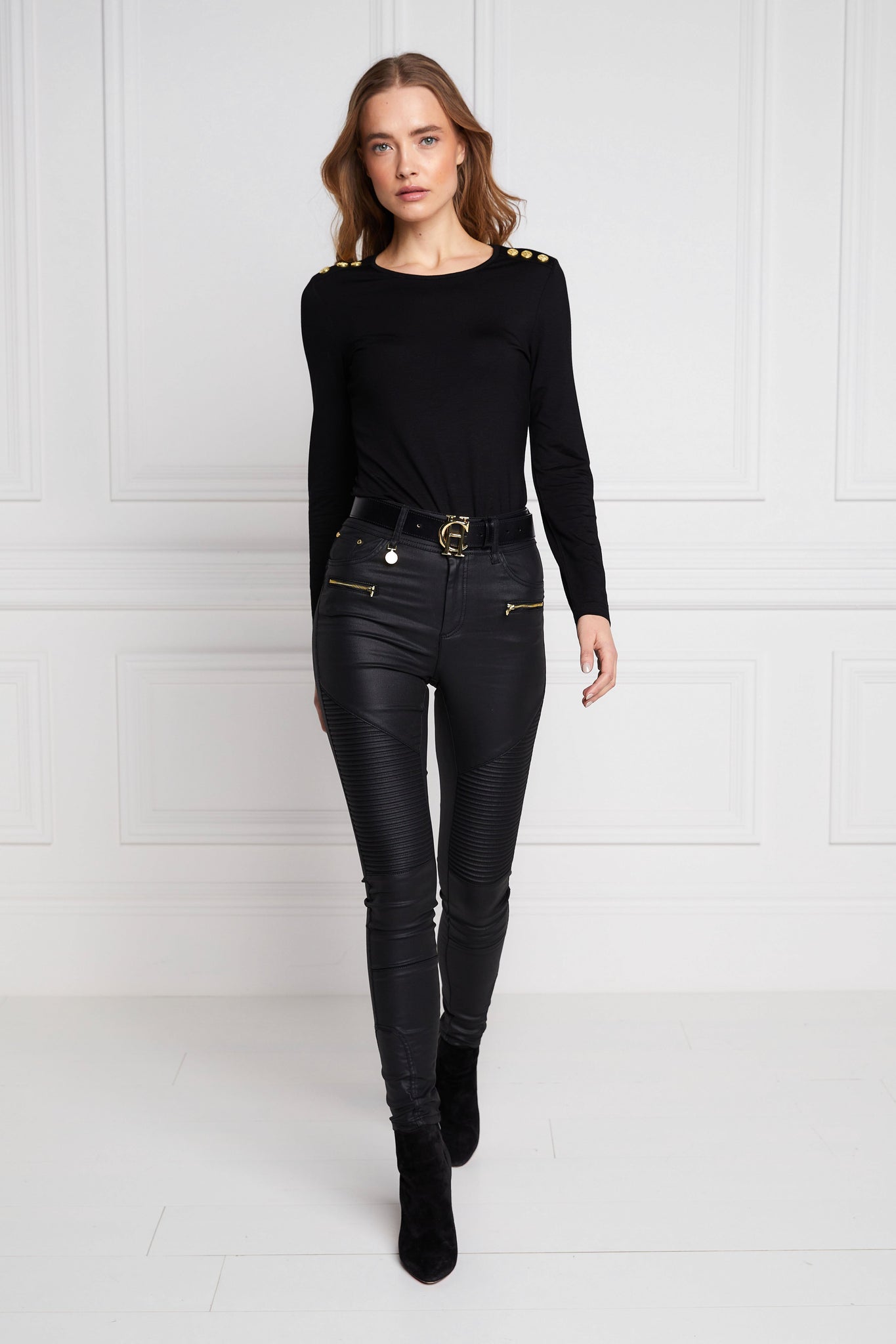 womens high rise black coated skinny jean for a leather look with pin tuck biker panels to front and two open zip pockets on front with two open pockets on back