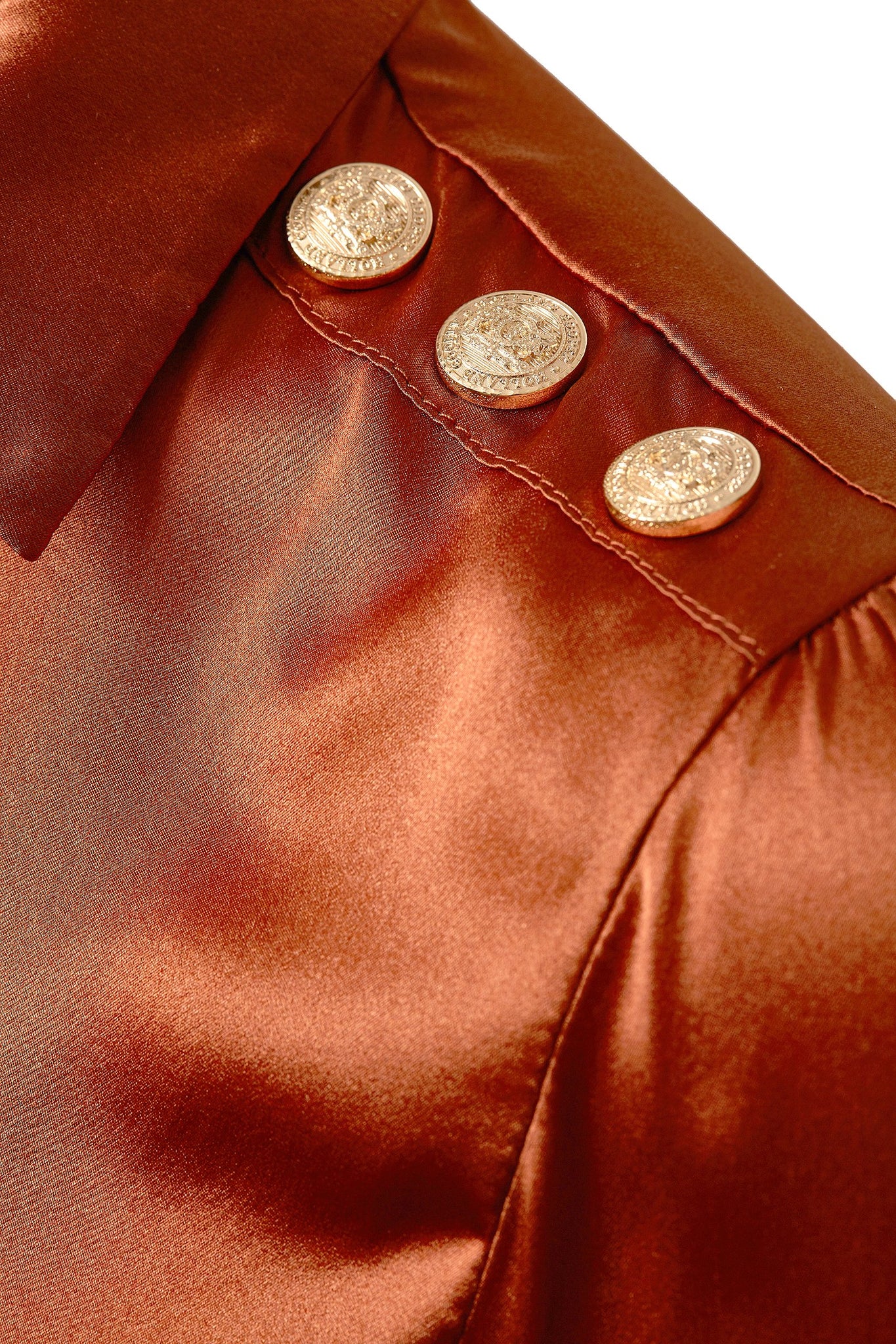 gold button shoulder on womens long sleeve burnt orange silk v neck blouse with gold buttons