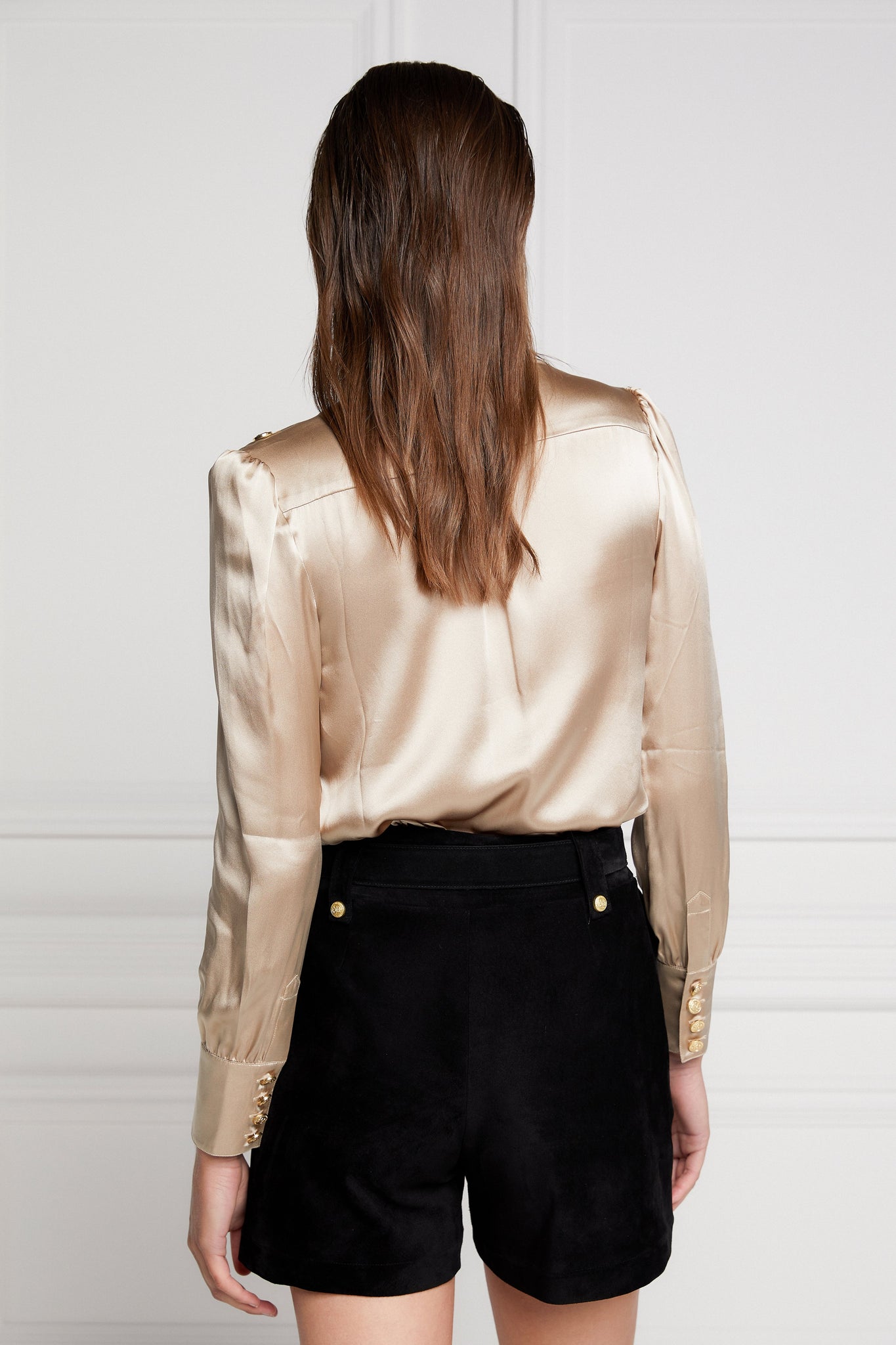 back of womens long sleeve champagne silk v neck blouse with gold buttons