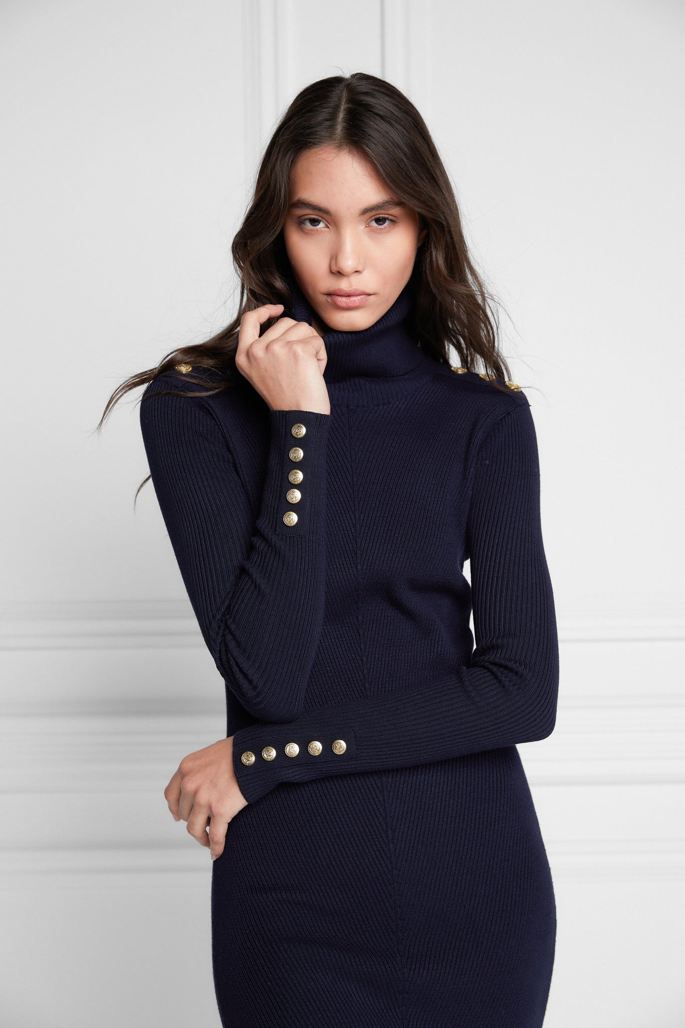 womens body-contouring navy knitted midi dress with ribbed roll neck and cuffs and gold buttons on shoulders and cuffs