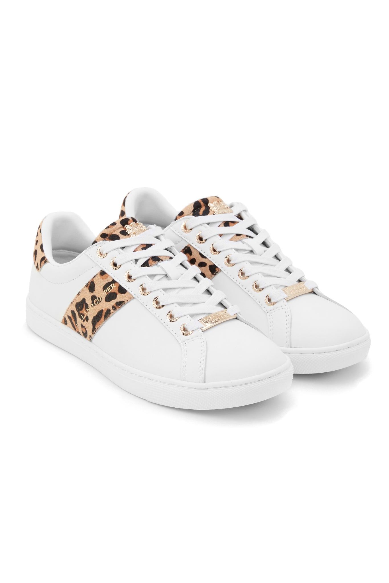 white leather trainers with white laces detailed with a diagonal stripe of leopard print on the side with gold foil branding and a leopard print heel and tongue with gold hardware