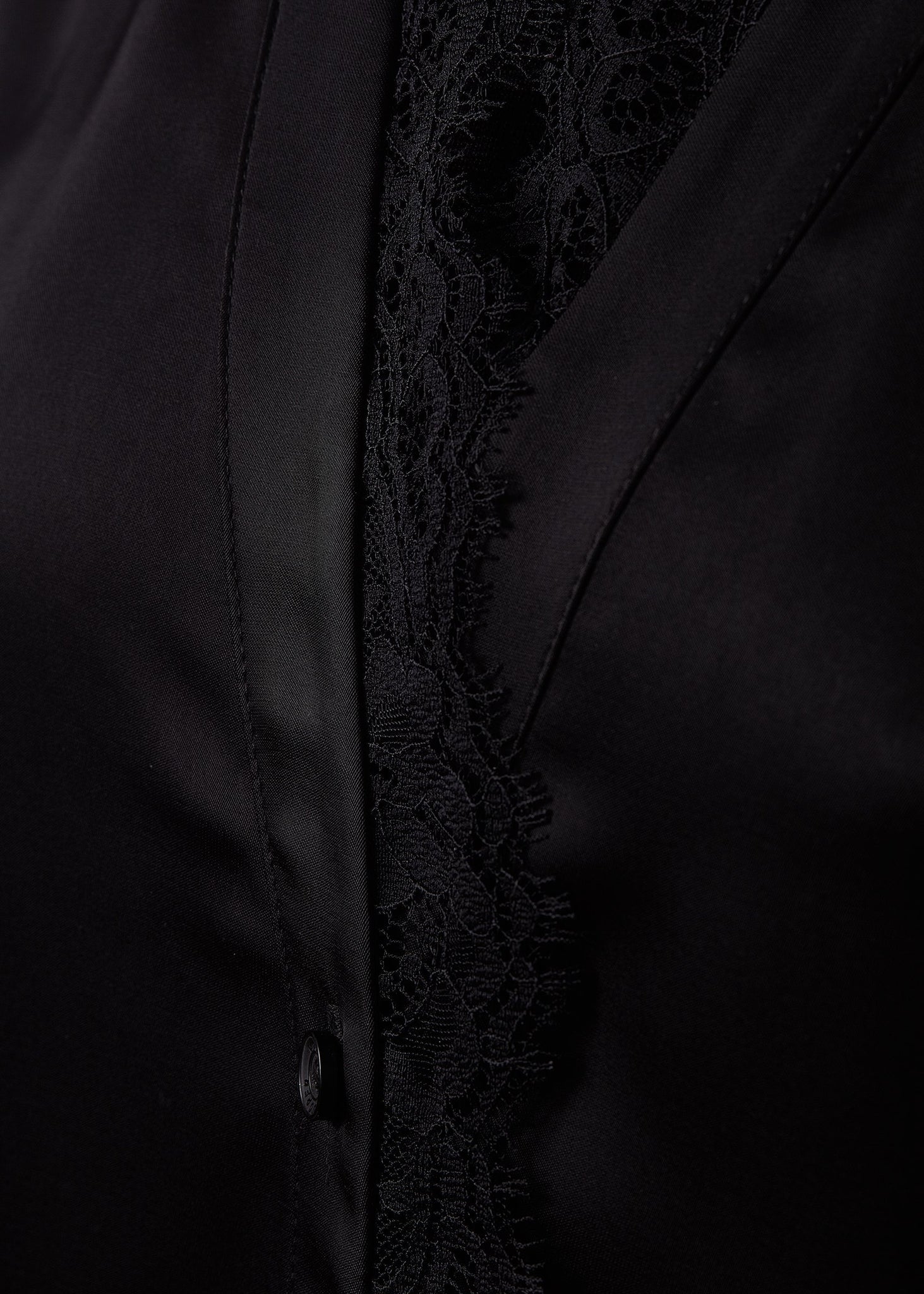 lace detail on womens black long sleeve silk v neck blouse with black lace hem details