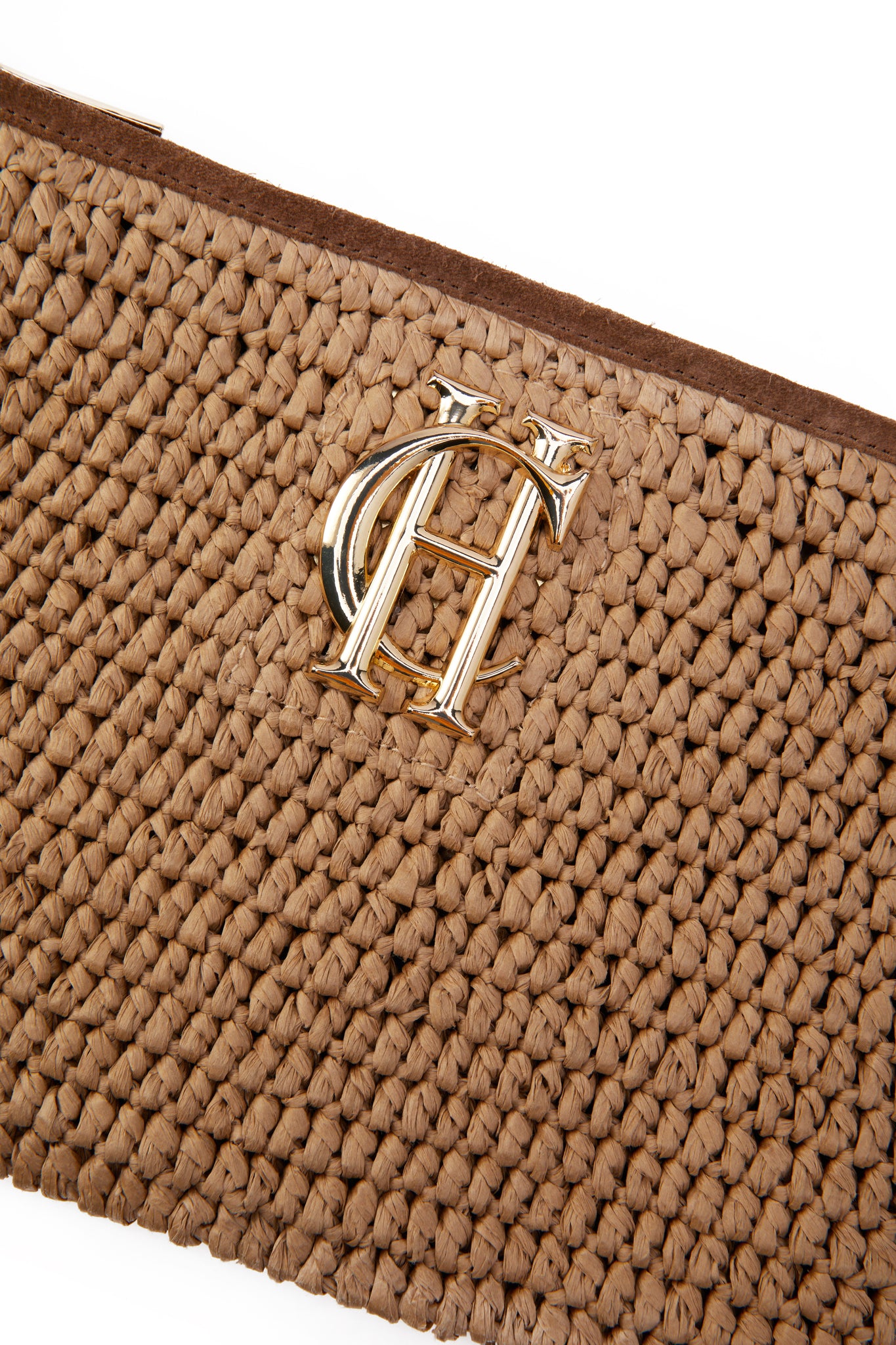 detail shot womens natural raffia bag with gold hardware