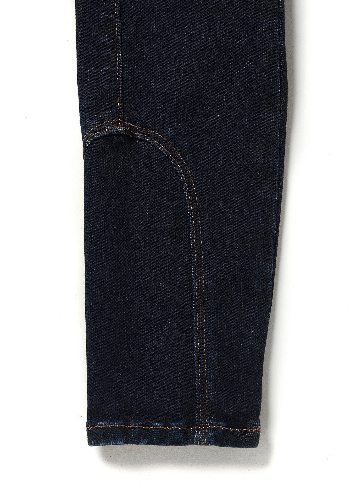 jodhpur style seams on womens high rise dark blue denim skinny stretch thermal jean with two open pockets to the front and back with internal fleece lining and gold hc crest on front right pocket