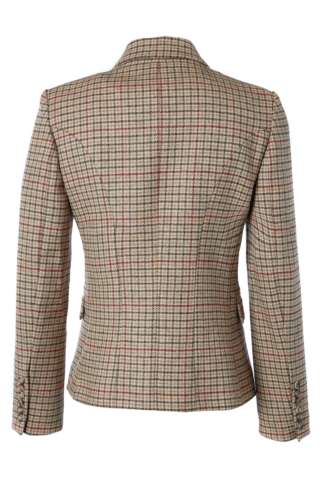 back of British made double breasted blazer that fastens with a single button hole to create a more form fitting silhouette with two pockets and horn button detailing this blazer is made from camel coloured charlton tweed