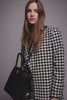 large black and white houndstooth wool wrap coat with large black and white houndstooth wool skirt and small black croc embossed leather tote bag