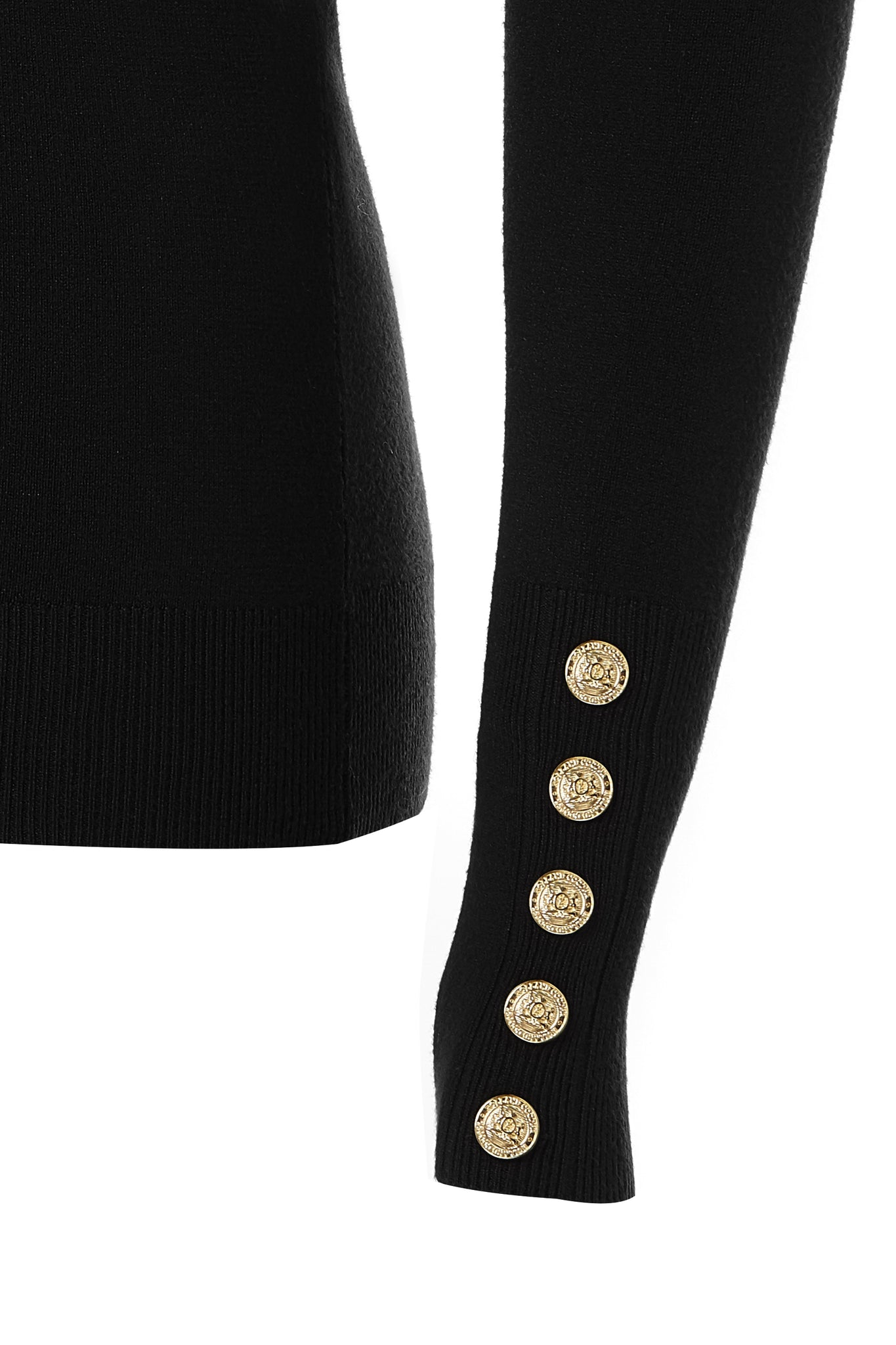 gold button detail of cuffs of super soft lightweight jumper in black with ribbed roll neck collar, cuffs and hem
