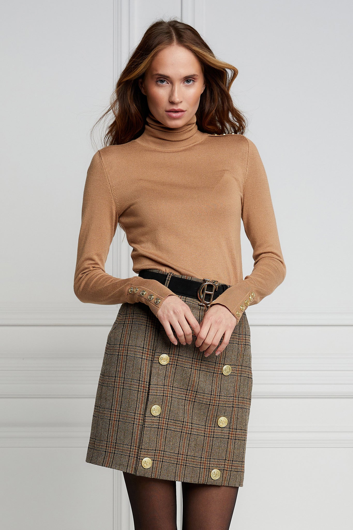 womens wool pencil mini skirt in green and red tweed check with concealed zip fastening on centre back and gold rivets down front