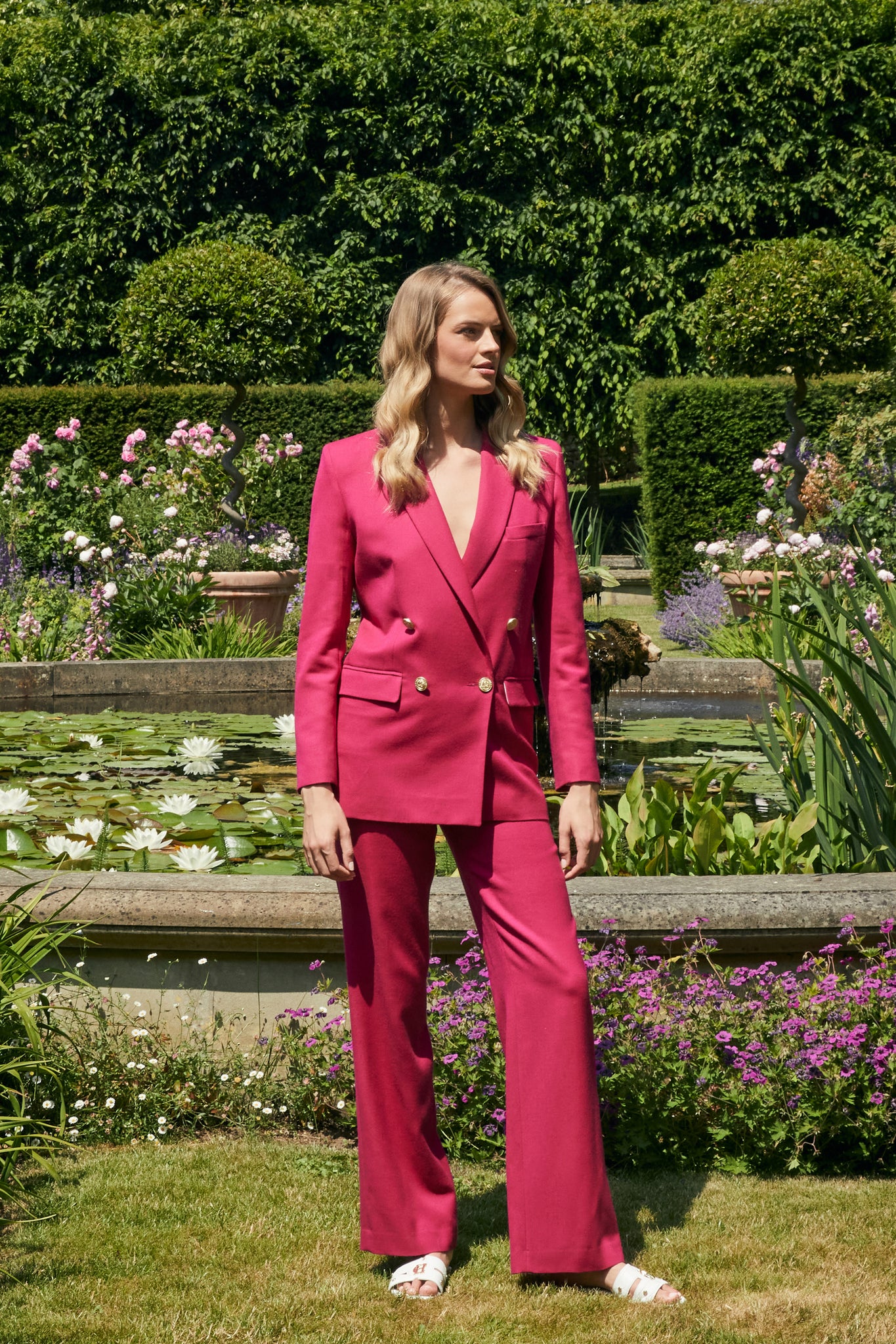 Women's hot pink wool high waisted straight trousers with hot pink double breasted wool blazer