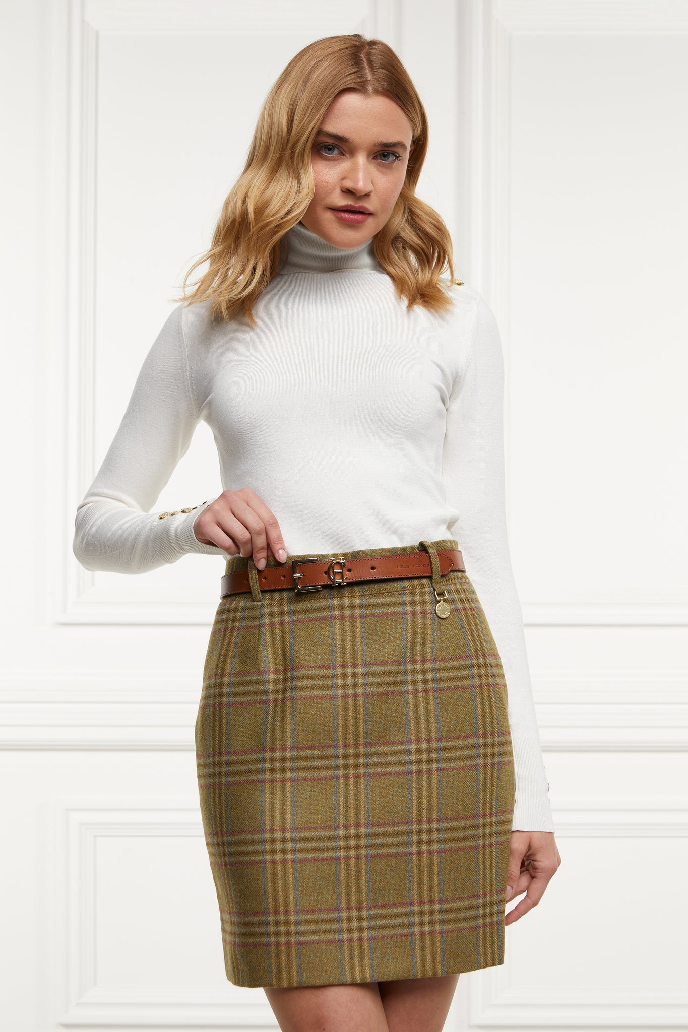 womens wool pencil mini skirt in green check with concealed zip fastening on centre back with gold hc button above zip