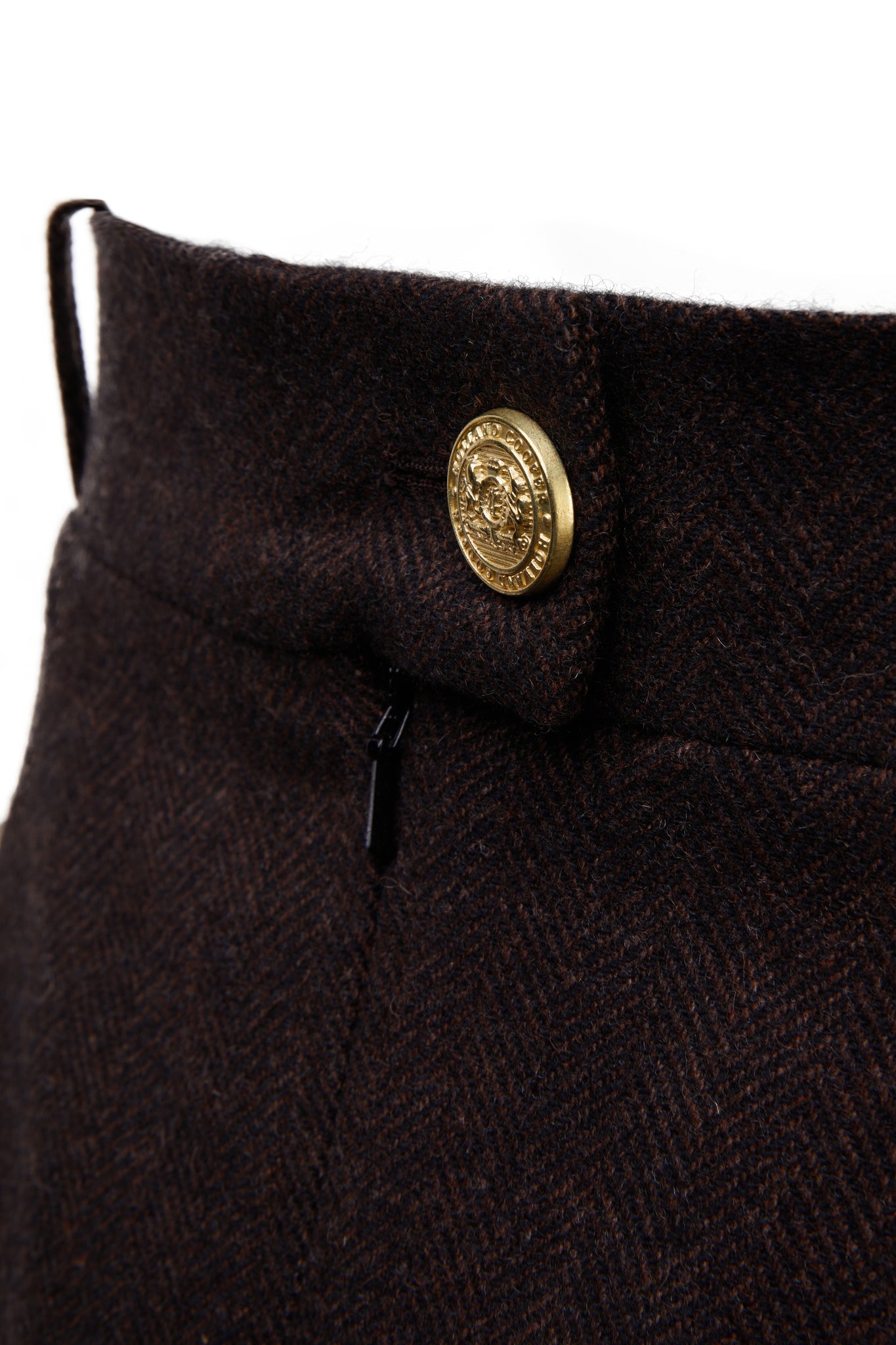 gold button detail on back waistband of womens brown wool pencil mini skirt with concealed zip fastening on centre back with gold hc button above zip