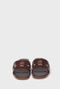 360 video of brown croc embossed leather sliders with a tan leather sole and gold hardware