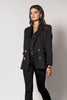 double breasted wool blazer in black with two hip pockets and gold button details down front and on cuffs and handmade in the uk