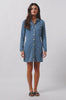video of womens long sleeve blue denim shirt mini dress with gold buttons down the front 