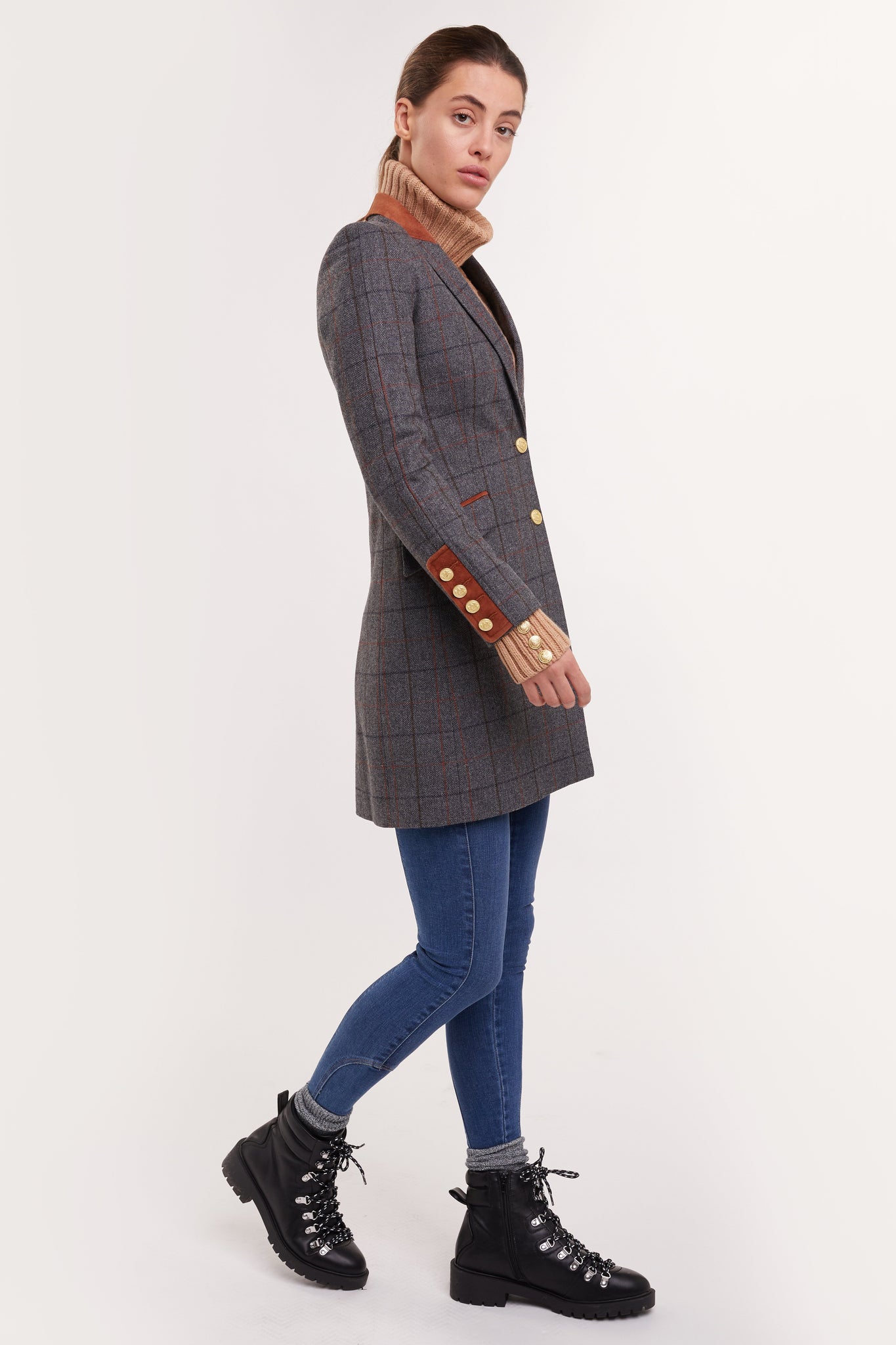 side of grey tweed womens coat with gold hardware and tan suede detailing