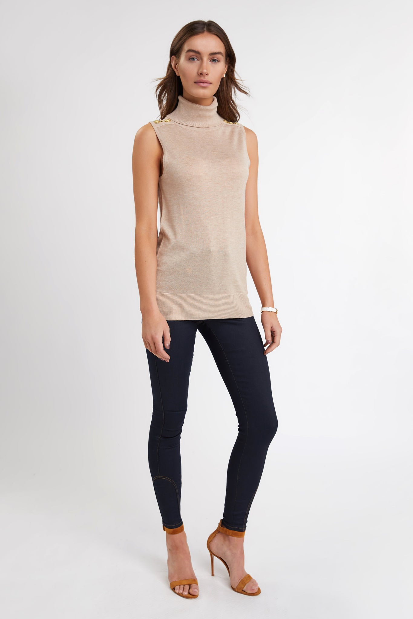 fitted lightweight sleeveless rollneck knit in camel with gold button detail across shoulders