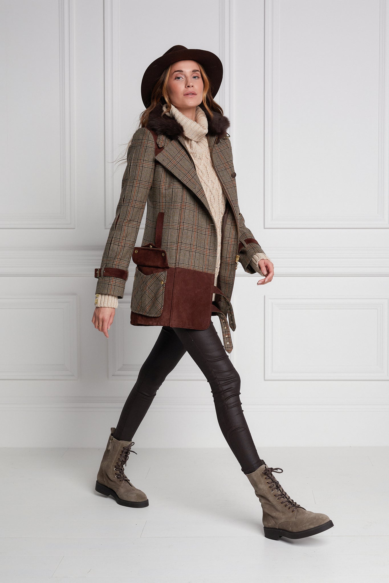 womens fitted field jacket in taupe brown orange and blue tweed trimmed with contrast chocolate suede on shoulder across back and on the hip with faux fur trim around the neck finished with horn button fastenings an buckles on the collar cuffs and hip