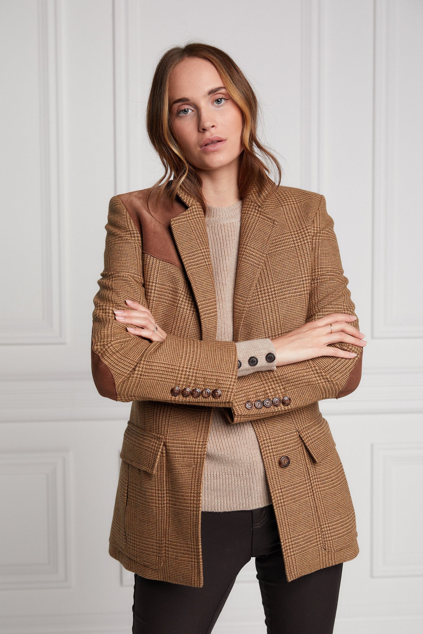 womens classic slim fit single breasted blazer in tawny and brown check with lower patch pockets with concealed button flap contrast tan suede shoulder gun patch with elbow patches and horn button finish on cuffs and front