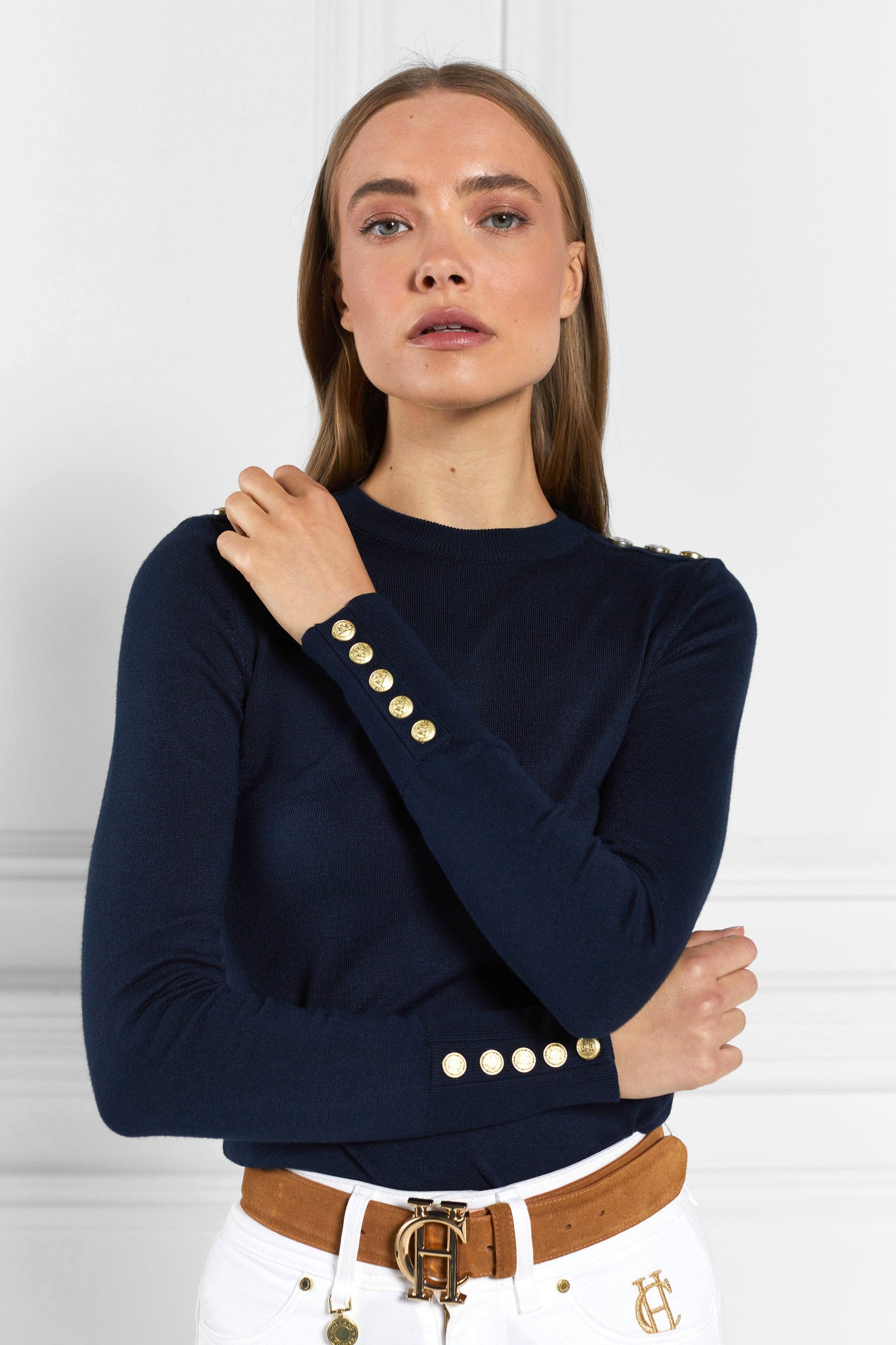 super soft lightweight jumper in navy with ribbed crew neck collar, cuffs and hem and gold button detail across shoulders and cuffs