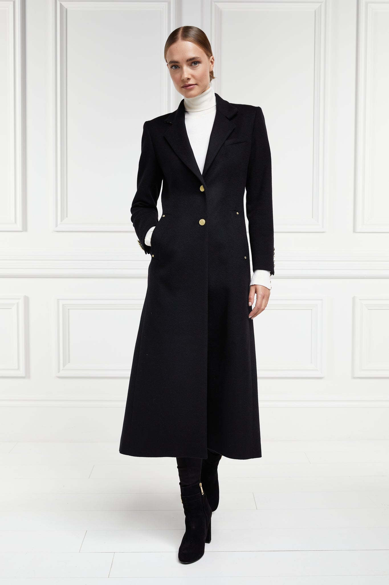 front of black single breasted full length wool coat