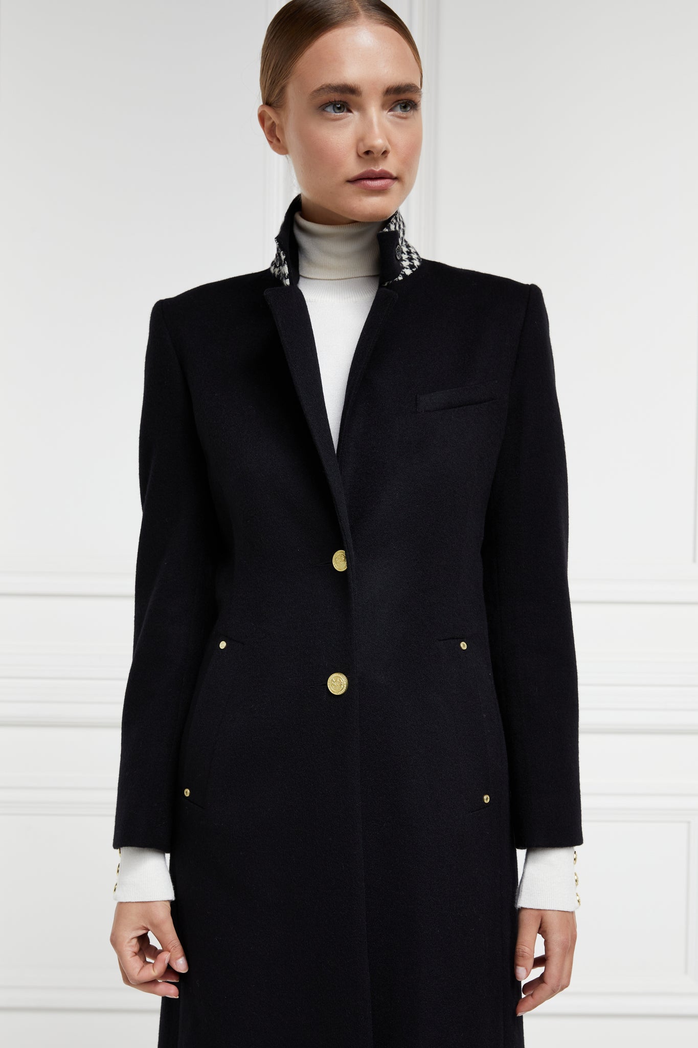 black single breasted full length wool coat