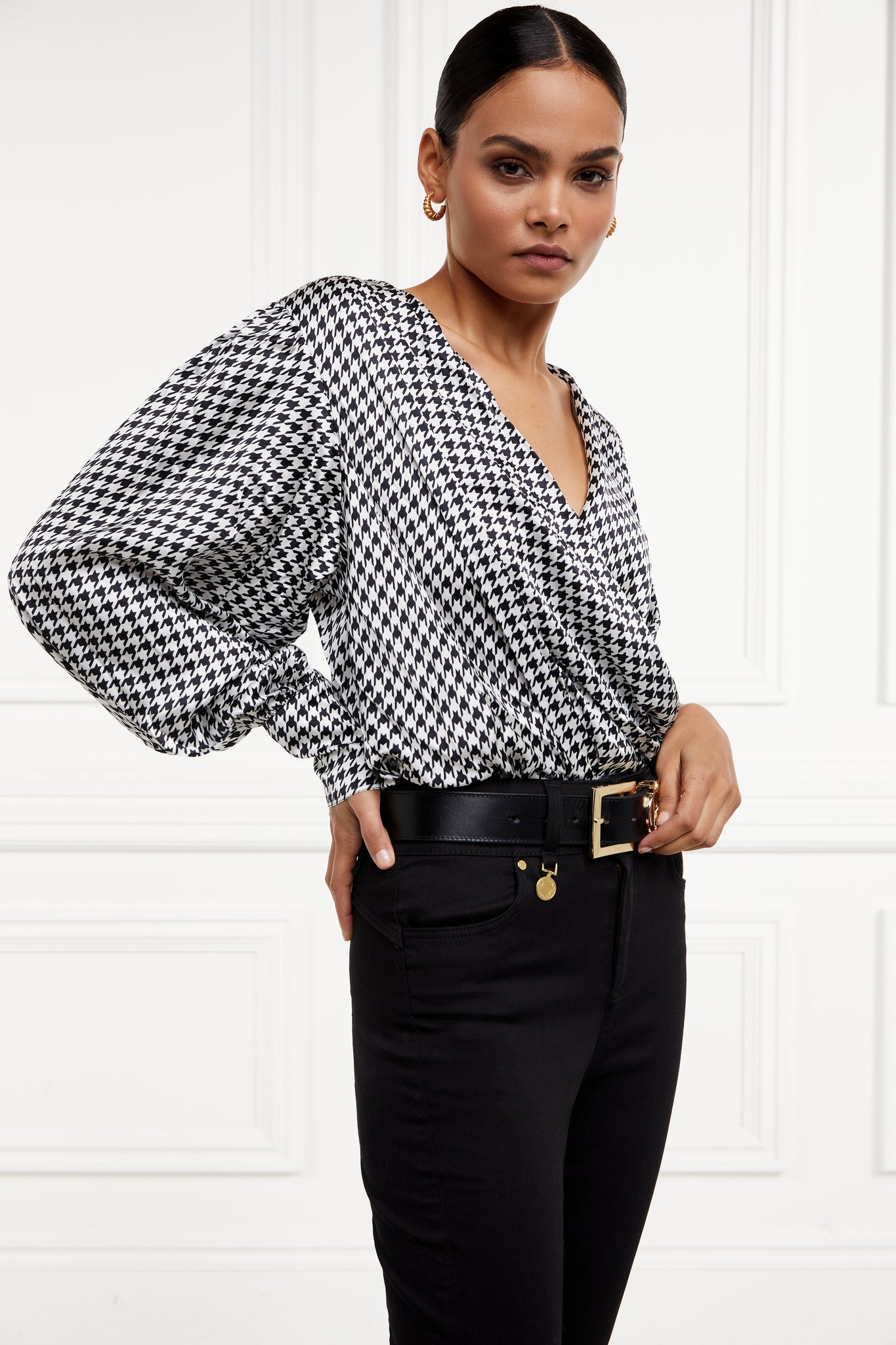 side of womens long sleeve silk houndstooth wrap front bodysuit with balloon sleeve