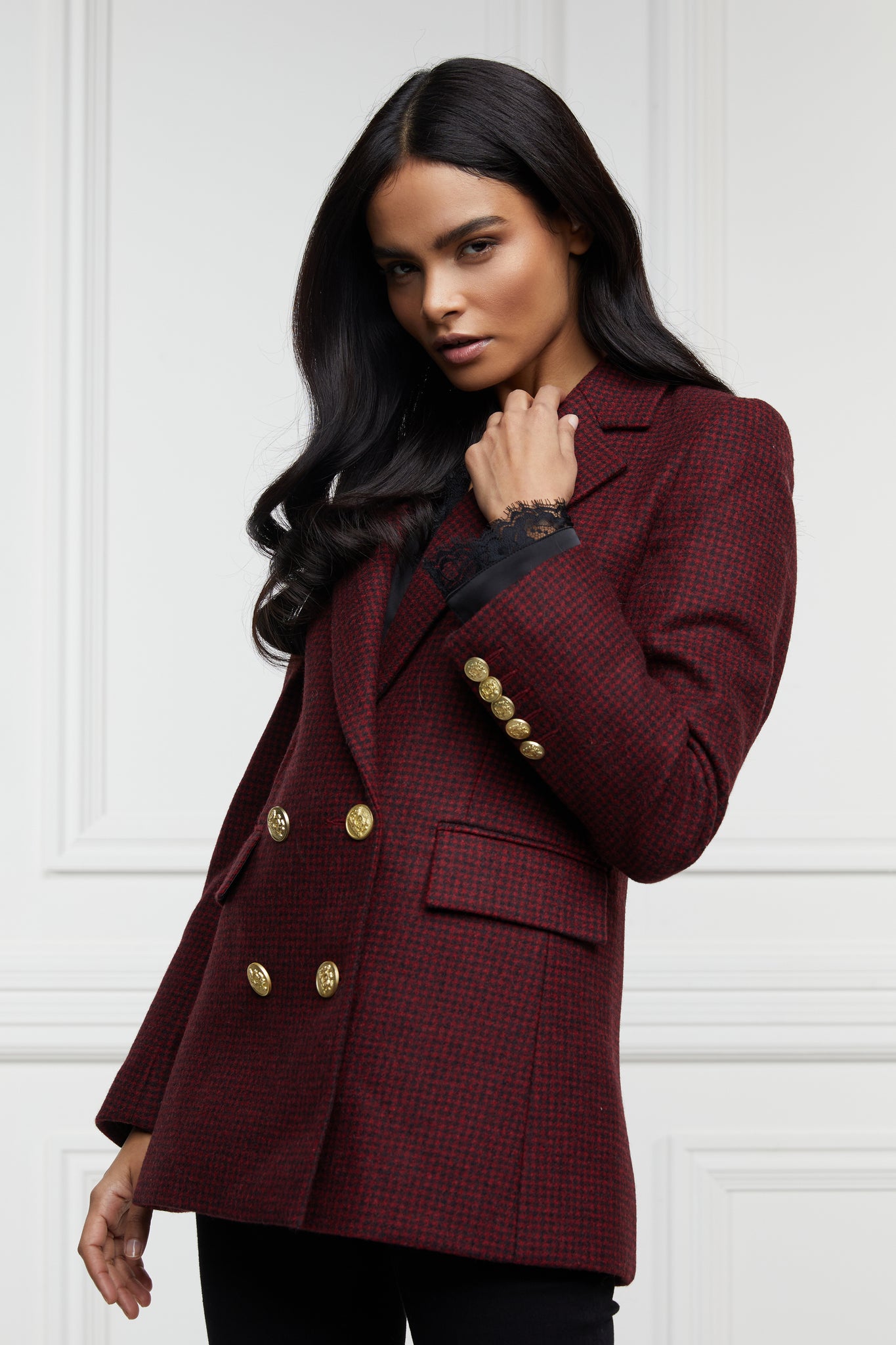 double breasted wool blazer in deep red houndstooth with two hip pockets and gold button detials down front and on cuffs and handmade in the uk