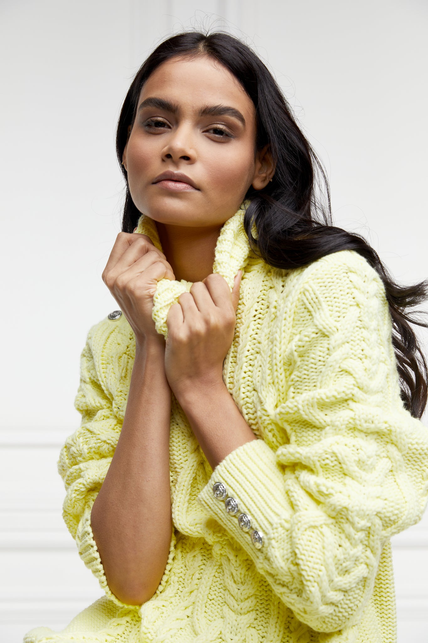 chunky cable knit jumper in lemon yellow with ribbed roll neck hem and cuffs