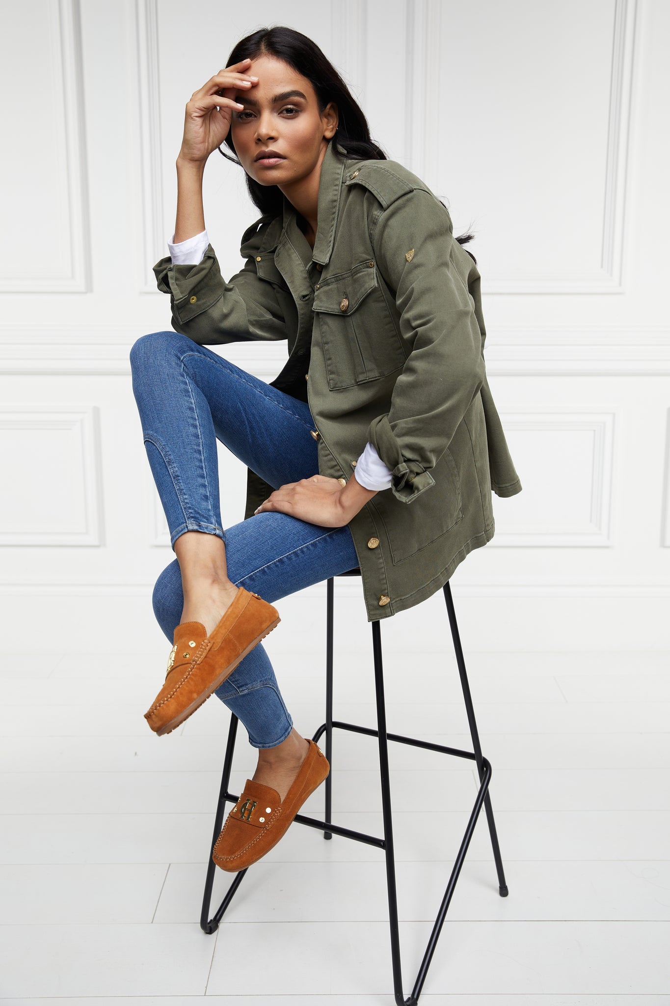 Relaxed fit collared artillery style jacket in khaki with four pockets two chest ones being box pleated  and two hip being patch pockets with gold jean button fastenings adjustable long sleeves and epaulette shoulder detail