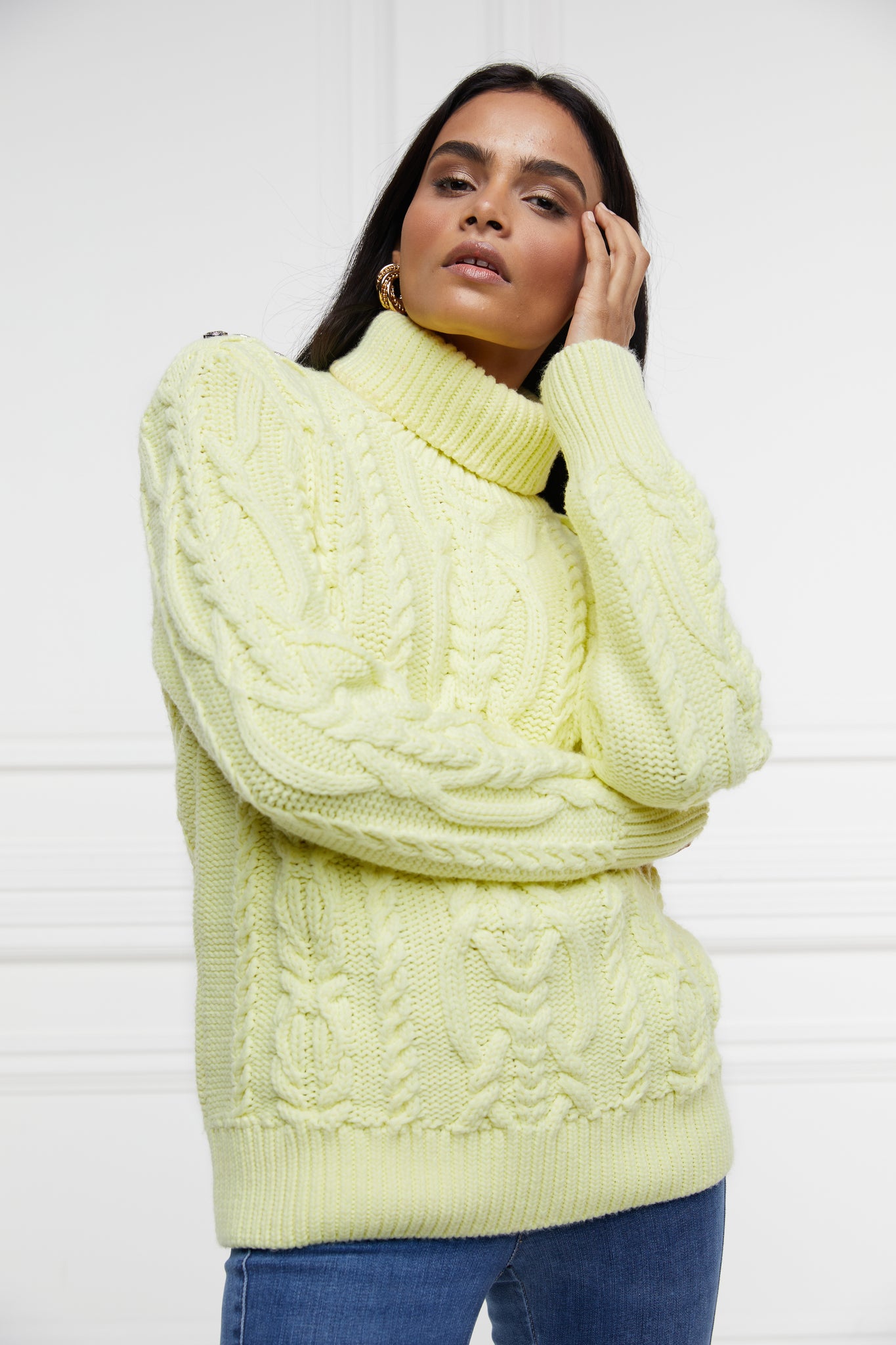 chunky cable knit jumper in lemon yellow with ribbed roll neck hem and cuffs