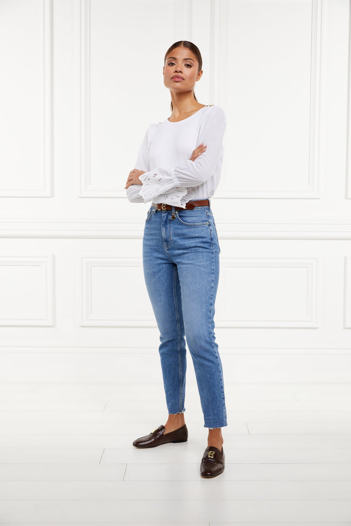 Crew neck top with voluminous sleeves with gathered details at the shoulder and broderie detailing above the cuff and detailed with Holland Cooper rivets on the shoulders