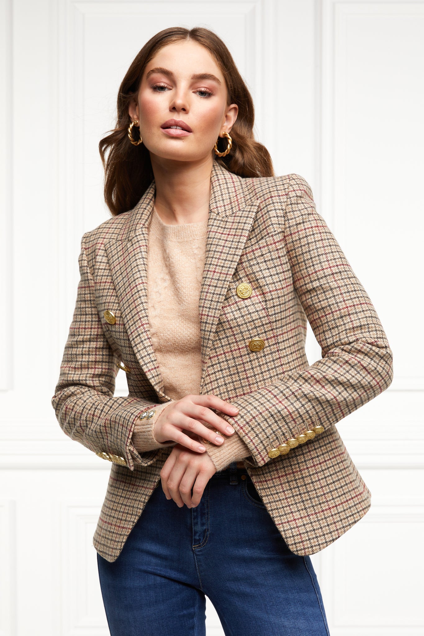 British made double breasted blazer that fastens with a single button hole to create a more form fitting silhouette with two pockets and gold button detailing this blazer is made from camel black and red check charleton tweed