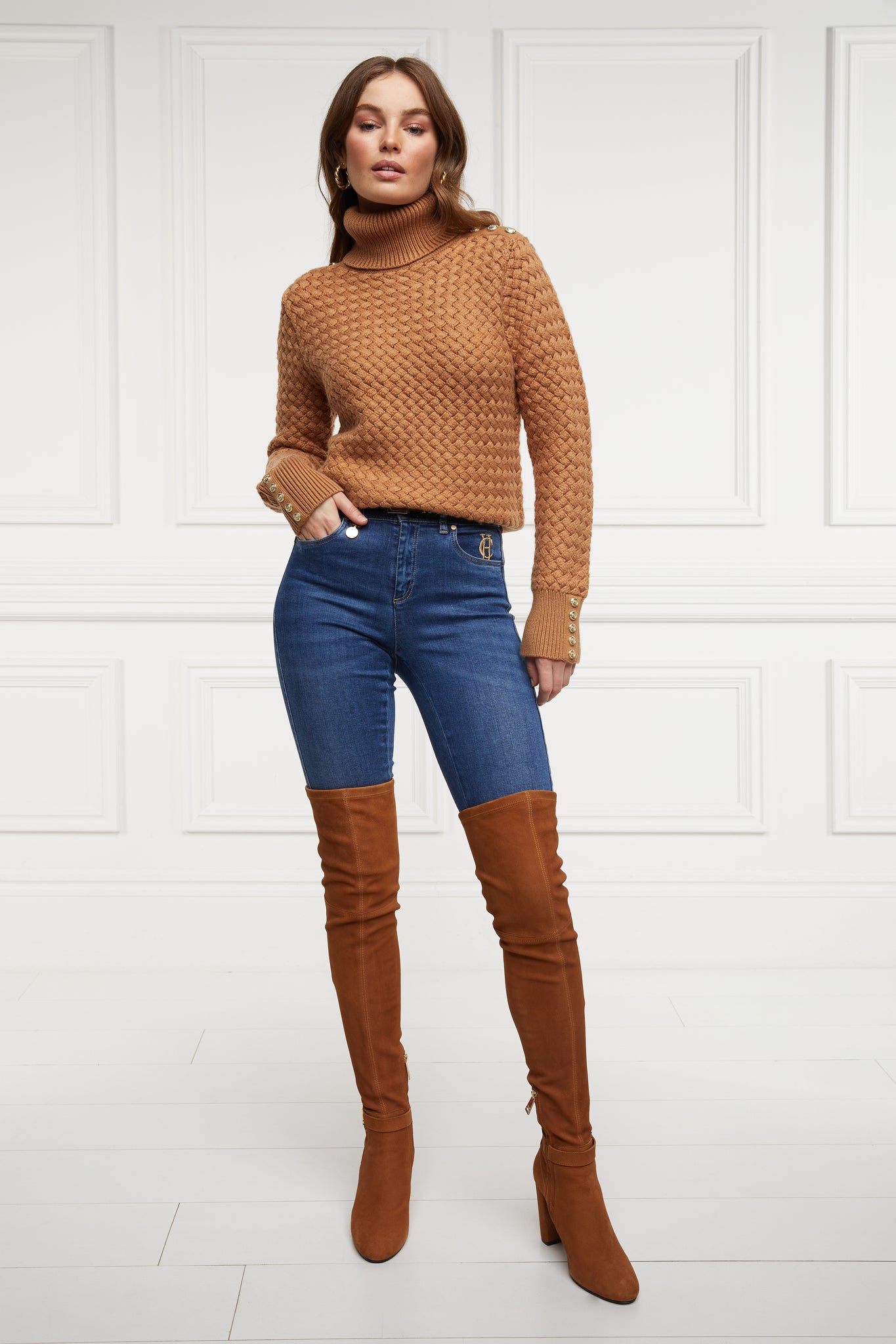 womens lightweight roll neck basket weave knit jumper in caramel worn with indigo blue jeans and tan over the knee boots