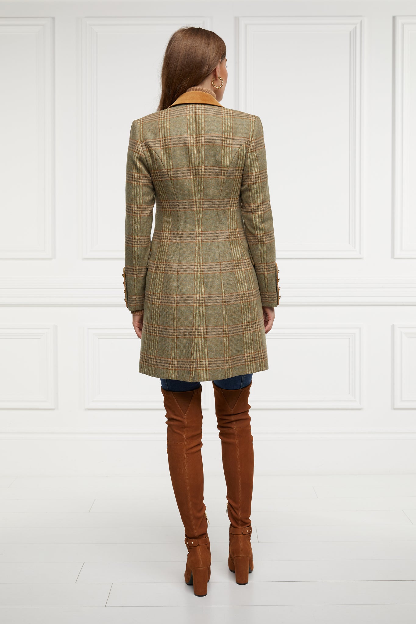 back shot of green tweed womens coat with gold hardware and tan suede detailing