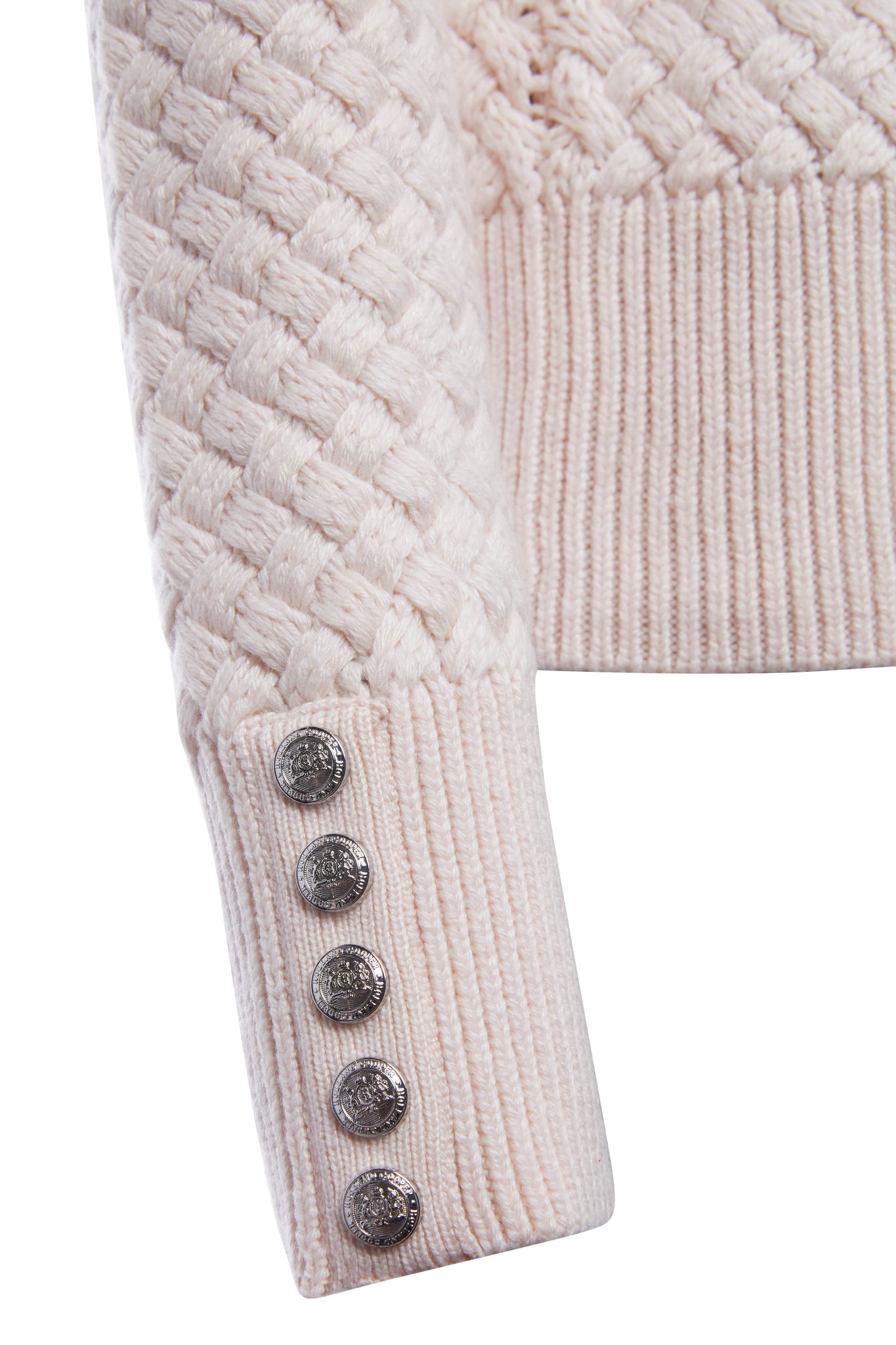 silver button cuff detail of womens lightweight roll neck basket weave knit jumper in powder pink 